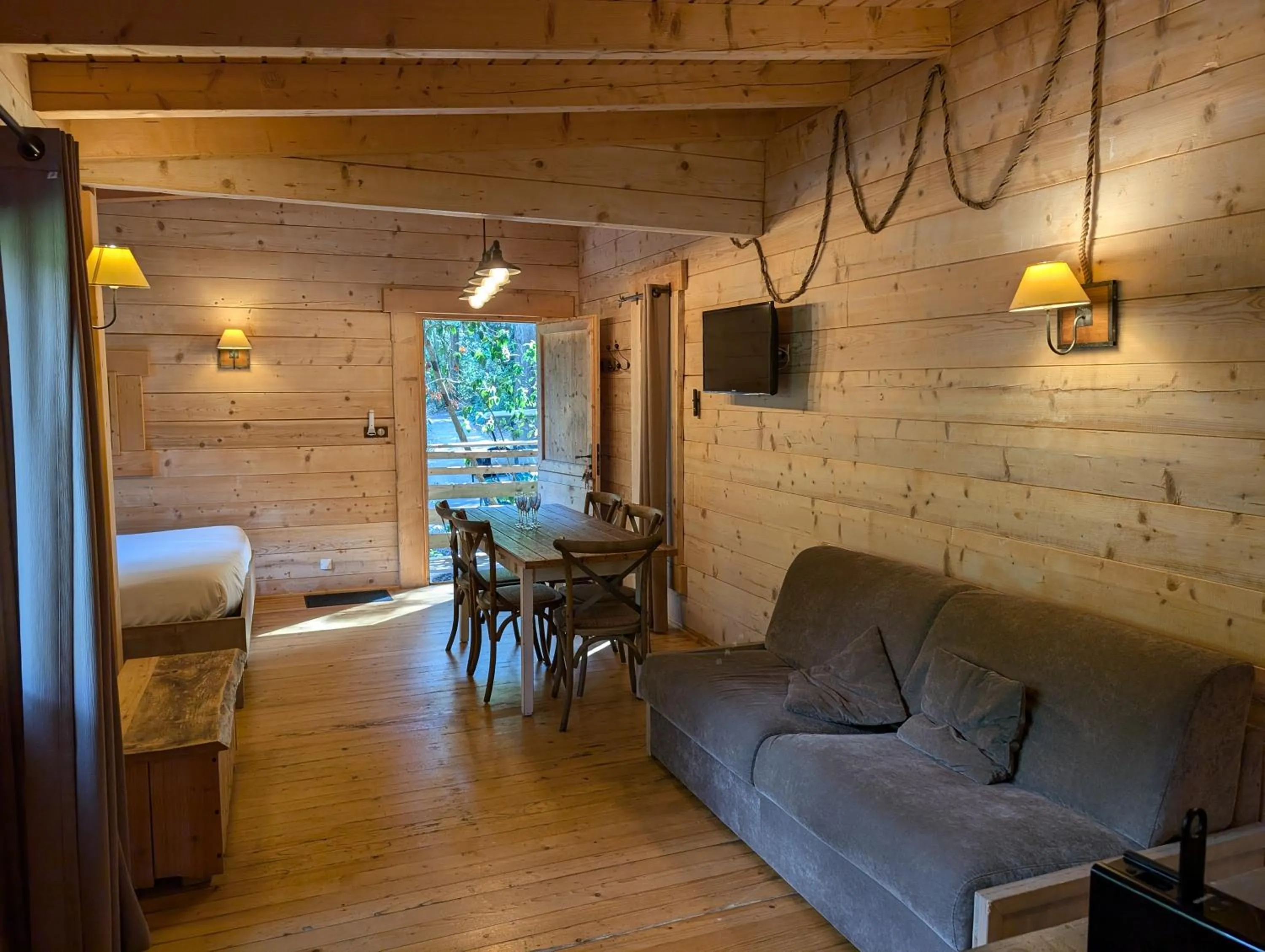 Bedroom in Les Cabanes Dans Les Bois Logis Hôtel