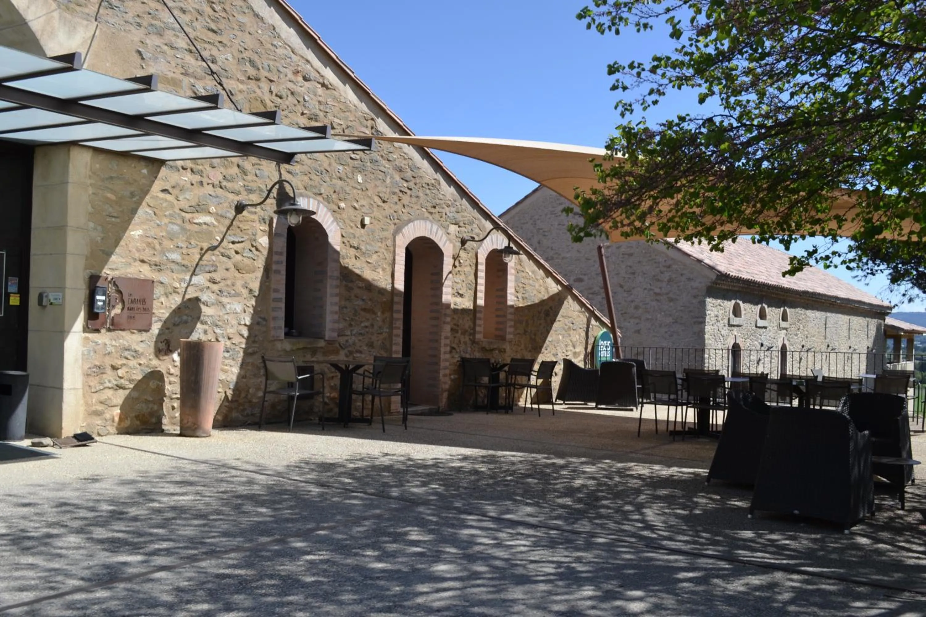 Balcony/Terrace in Les Cabanes Dans Les Bois Logis Hôtel