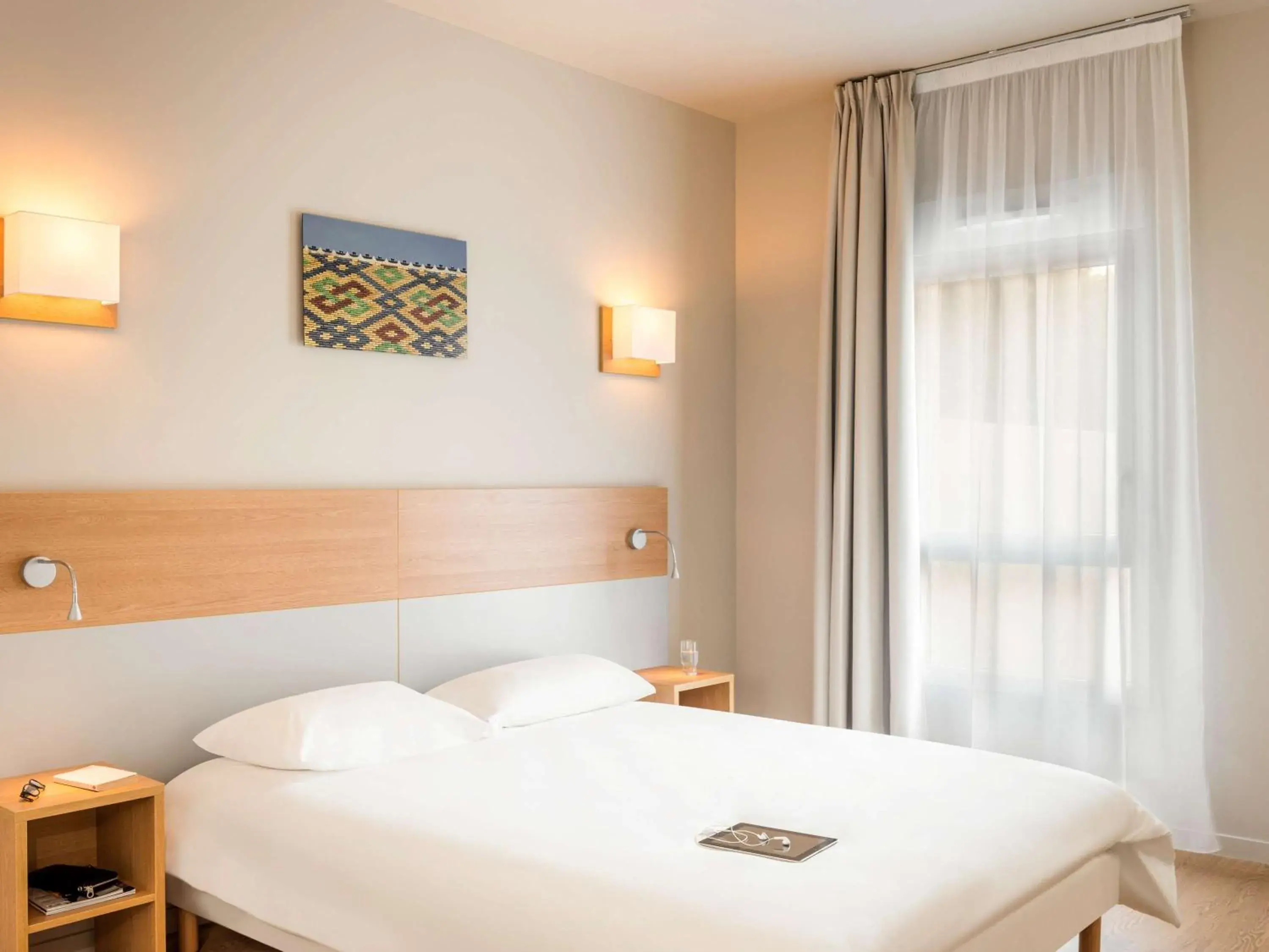 Photo of the whole room, Bed in Aparthotel Adagio Access Dijon République Photo of the whole room, Bed in Aparthotel Adagio Access Dijon République