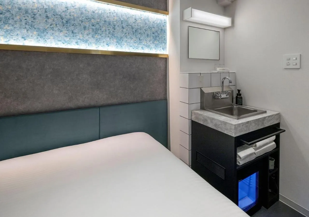 Decorative detail, Bed in HOTEL GRAPHY Shibuya