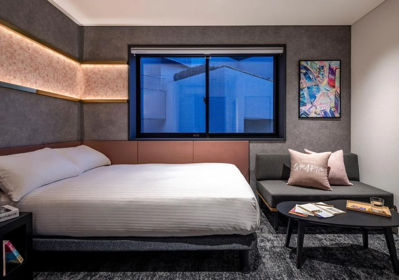 Bed in HOTEL GRAPHY Shibuya