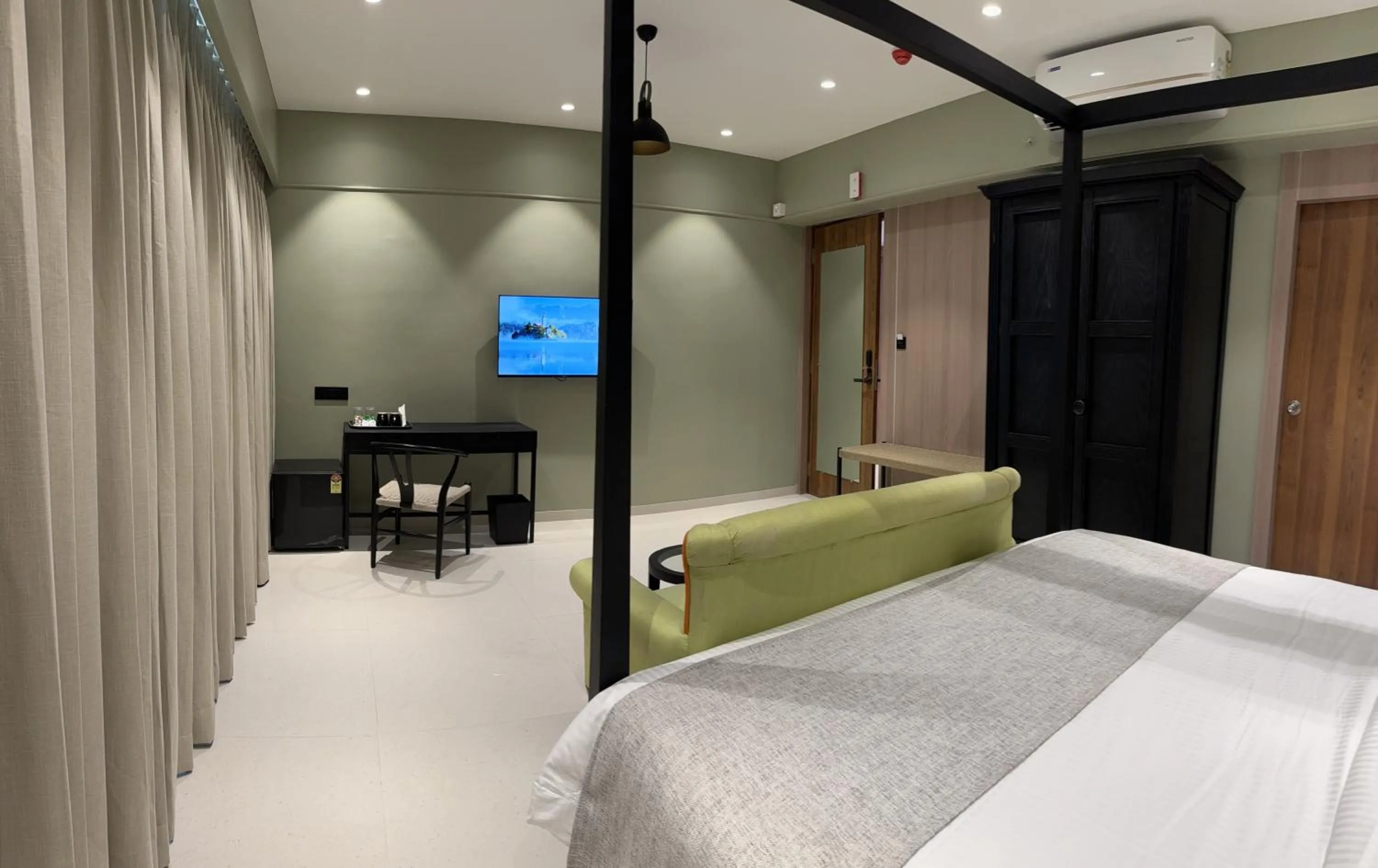 Photo of the whole room, Bed in Hotel Mumbai House, Valnai Malad