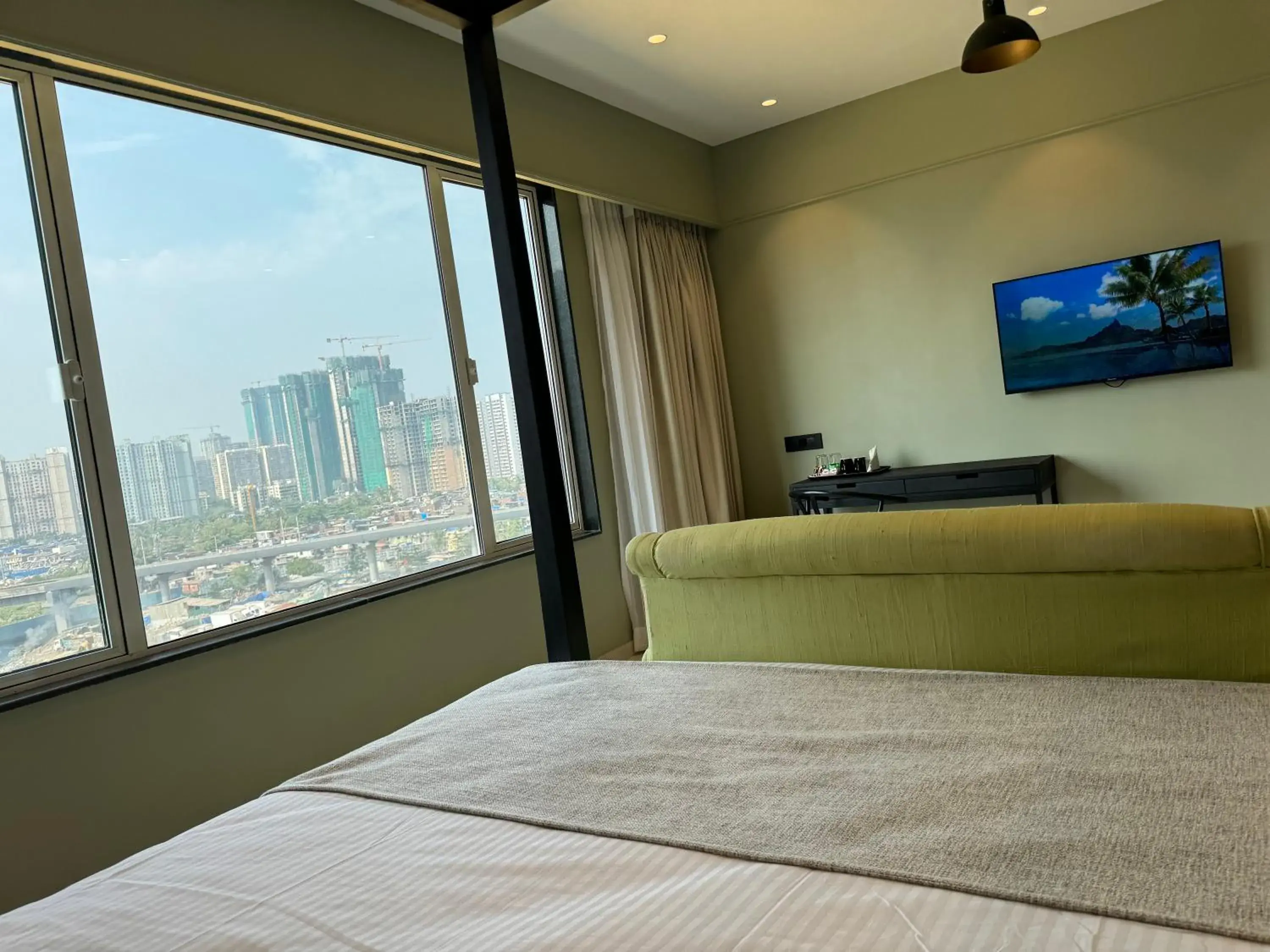City view, Bed in Hotel Mumbai House, Valnai Malad City view, Bed in Hotel Mumbai House, Valnai Malad