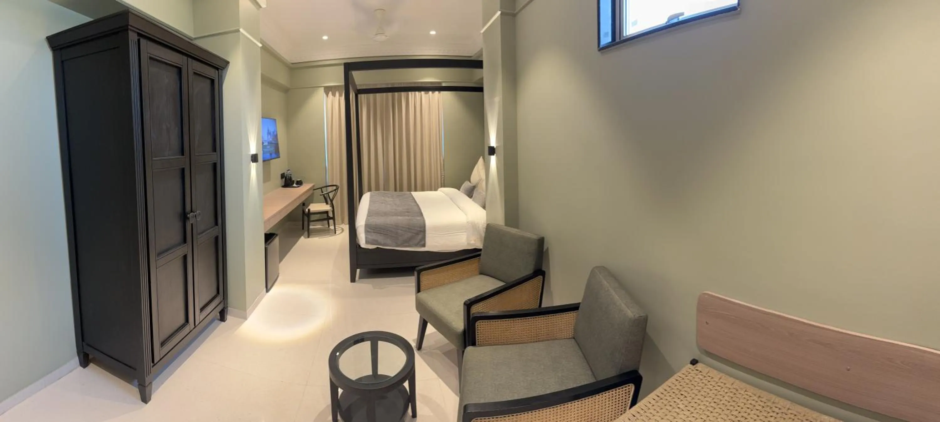 Seating area in Hotel Mumbai House, Valnai Malad