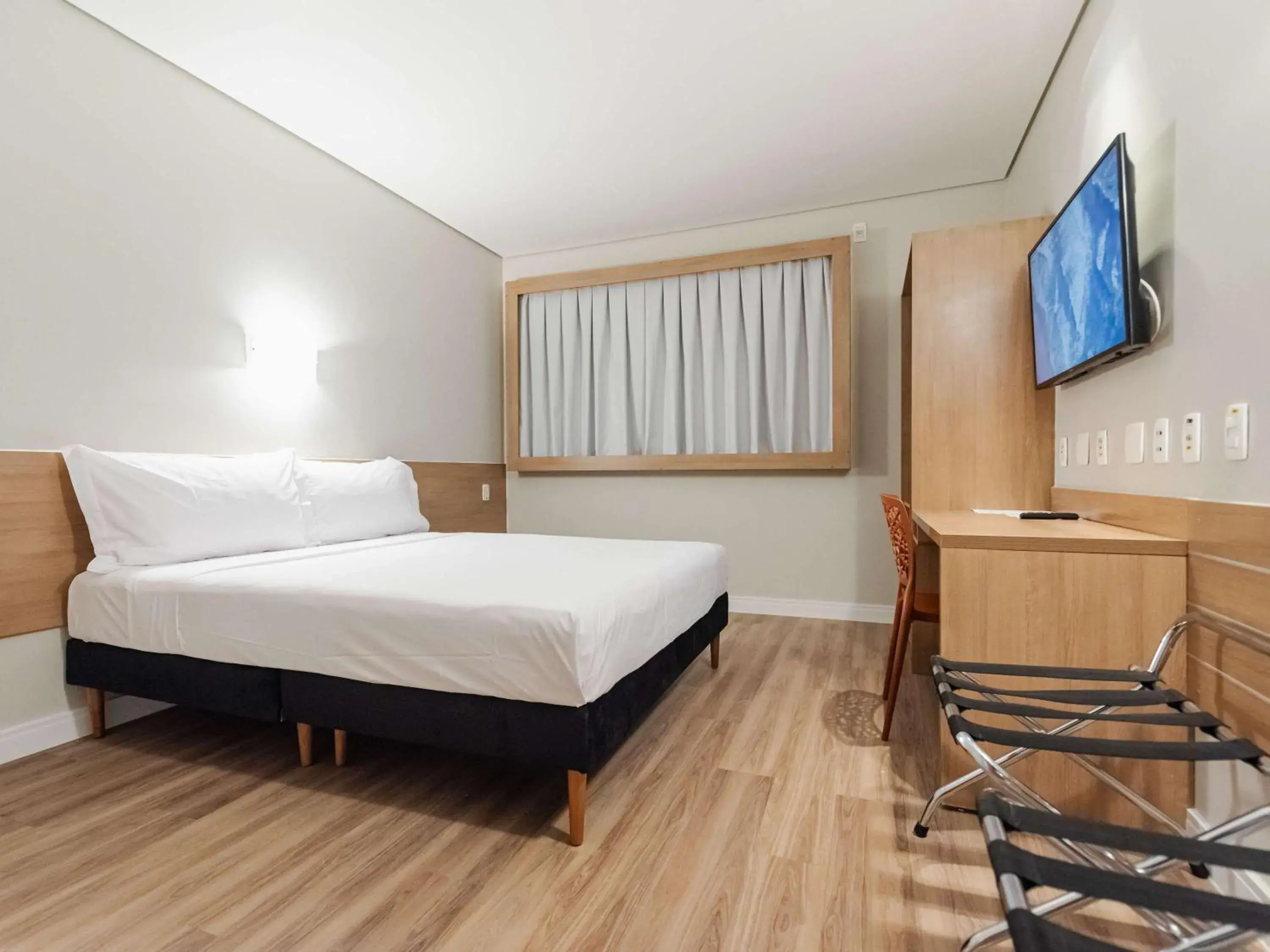 Communal lounge/ TV room, Bed in ibis Styles Goiânia Shopping Estação Communal lounge/ TV room, Bed in ibis Styles Goiânia Shopping Estação