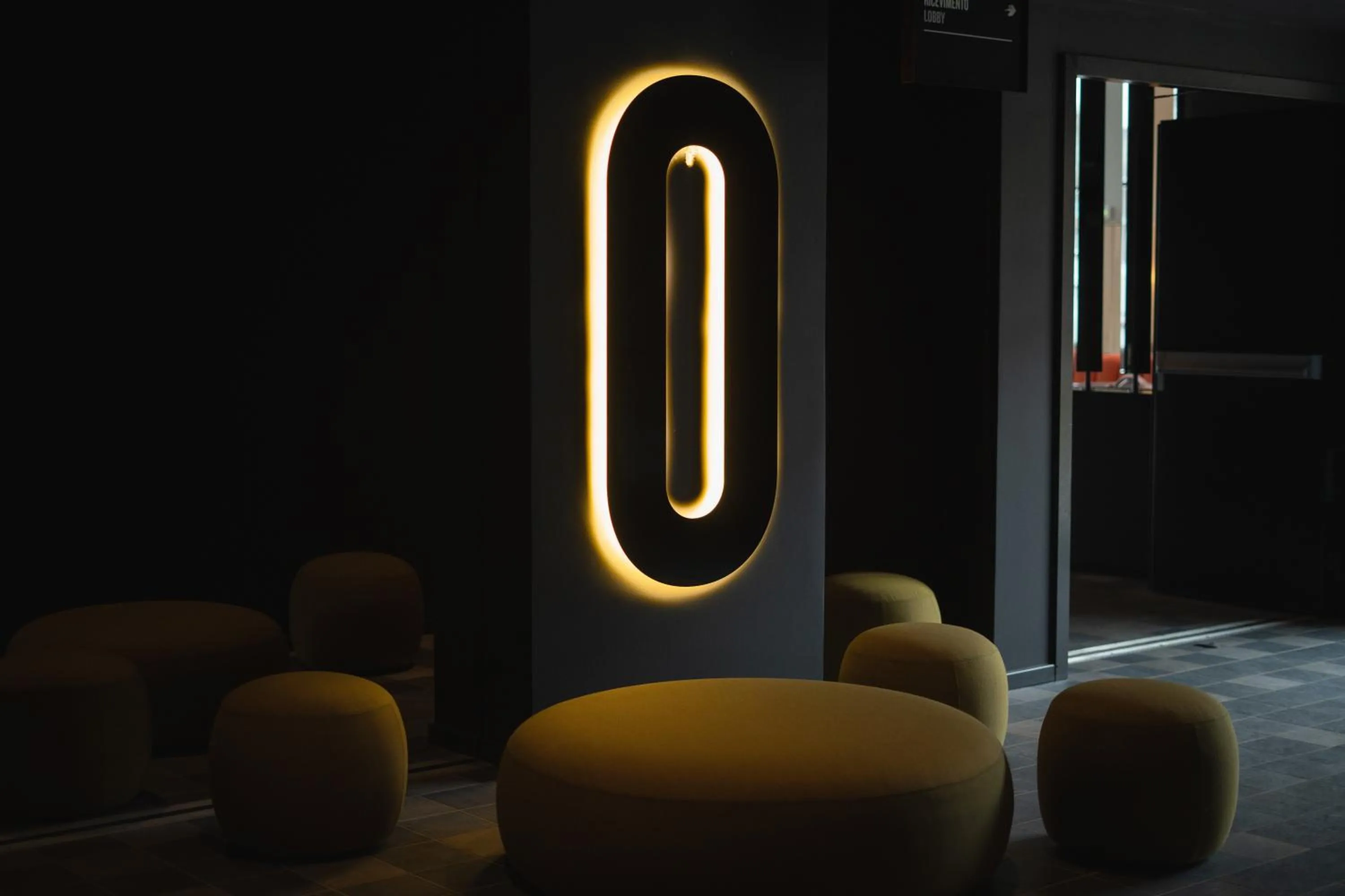 Seating area in TRIBE Milano Malpensa