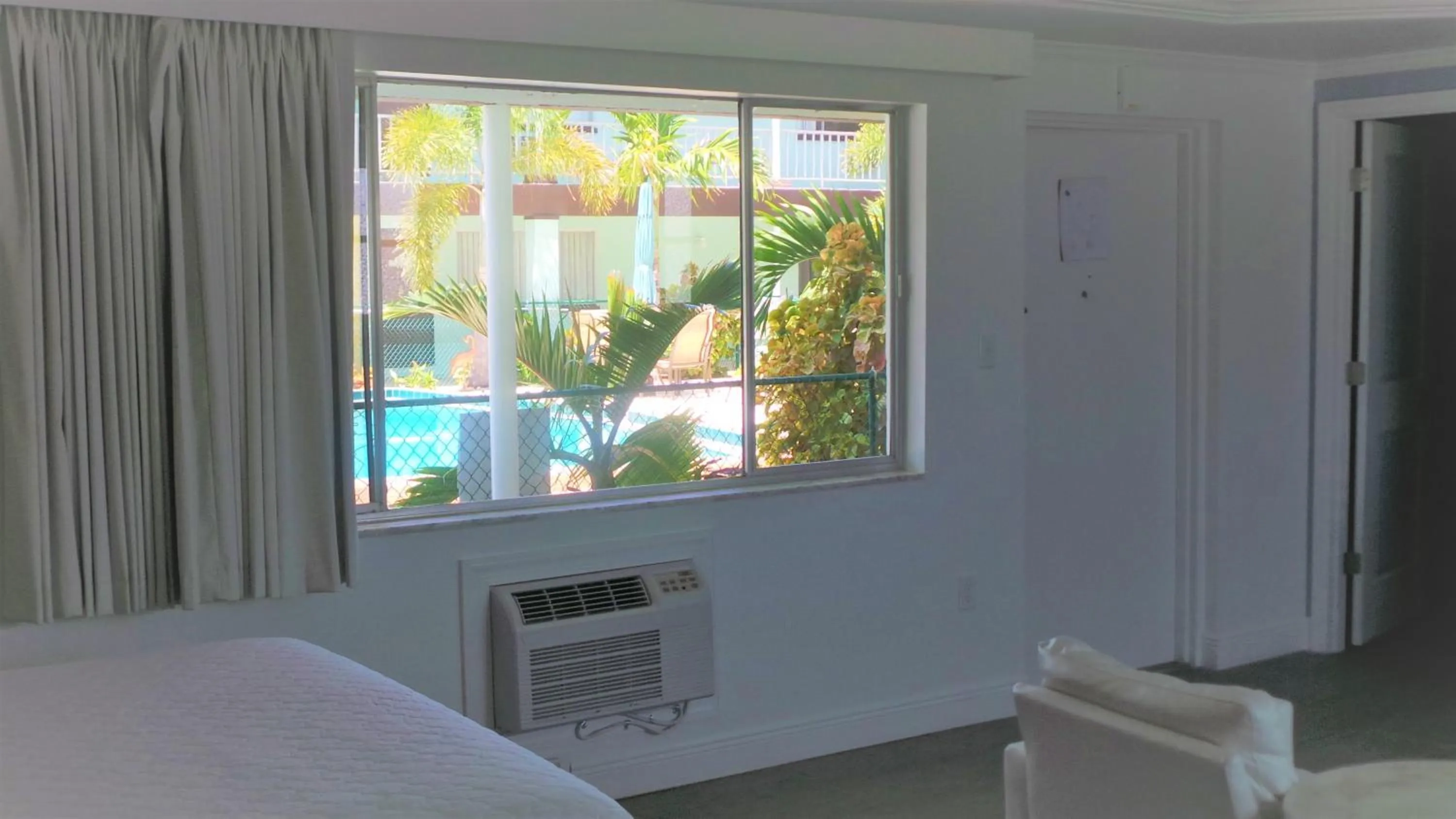 Pool view, Bed in Island House Resort Hotel