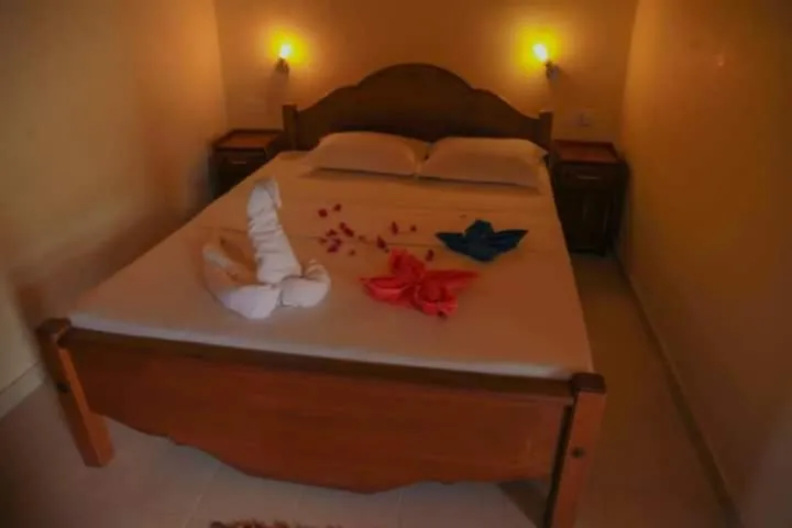 Bed in Rainforest Lodge, Deniyaya singheraja