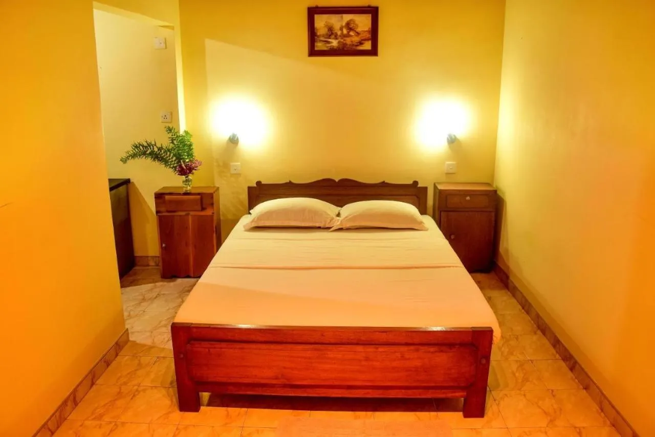 Bed in Rainforest Lodge, Deniyaya singheraja