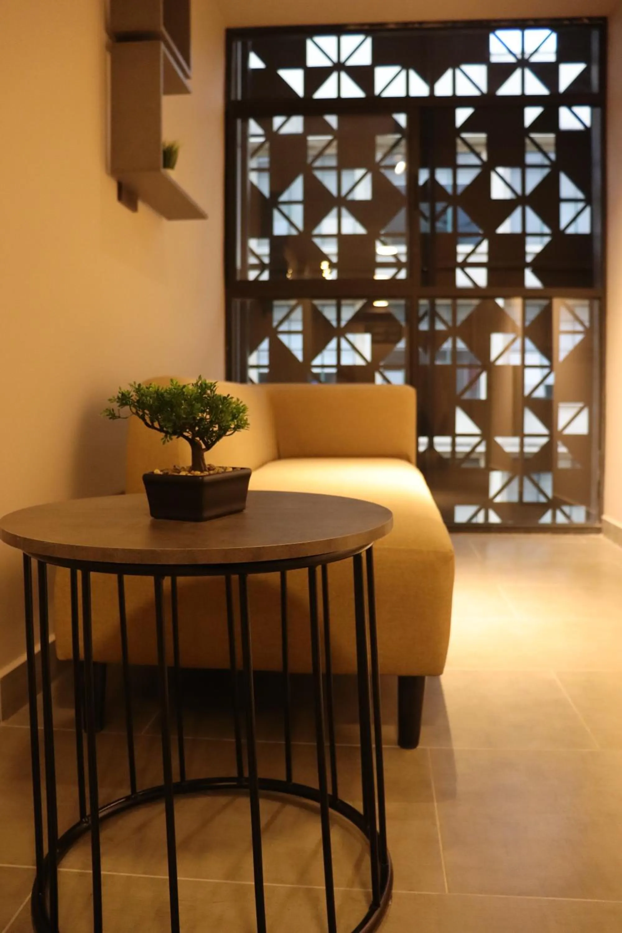 Living room in Giluxe Hotel