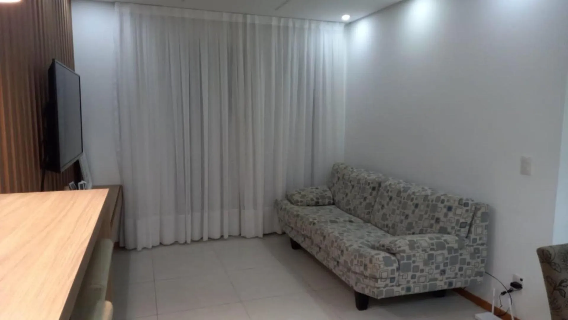 Living room in Velutti Prime View: Frente Mar