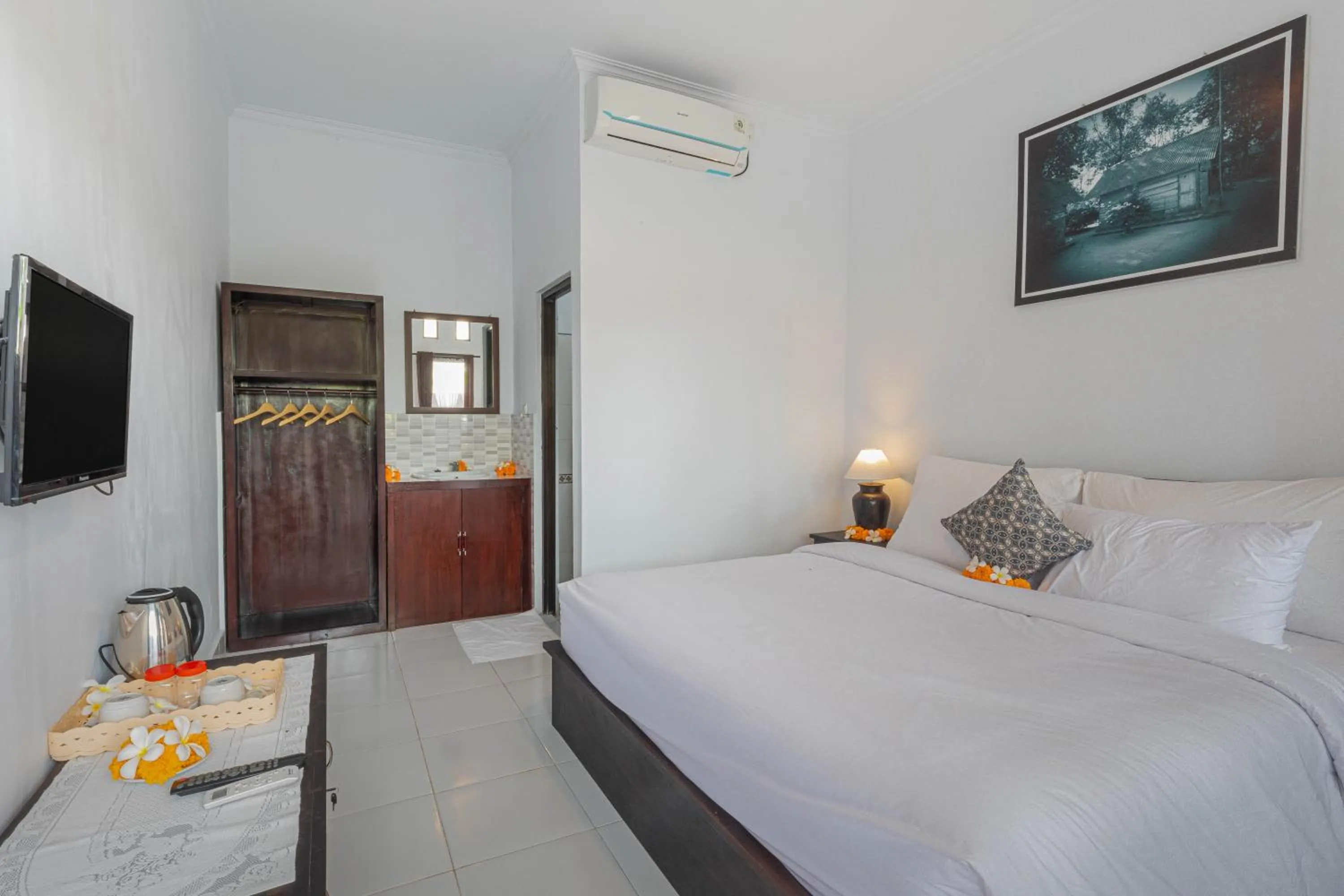 Bed in Sekar Bali Homestay