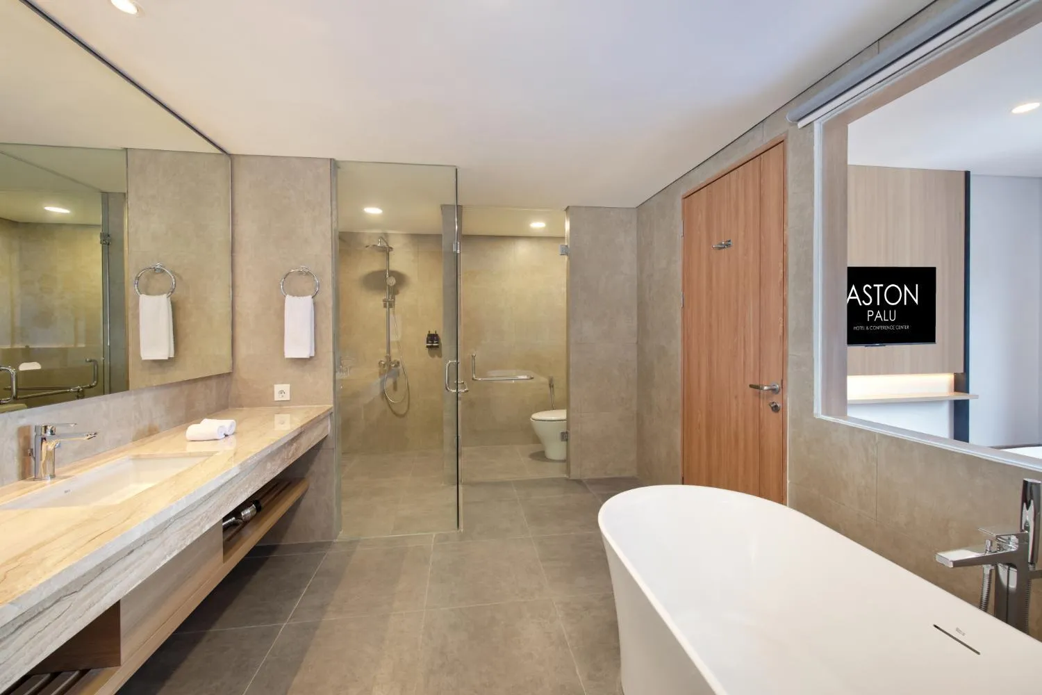 Bathroom in Aston Palu Hotel & Conference Center