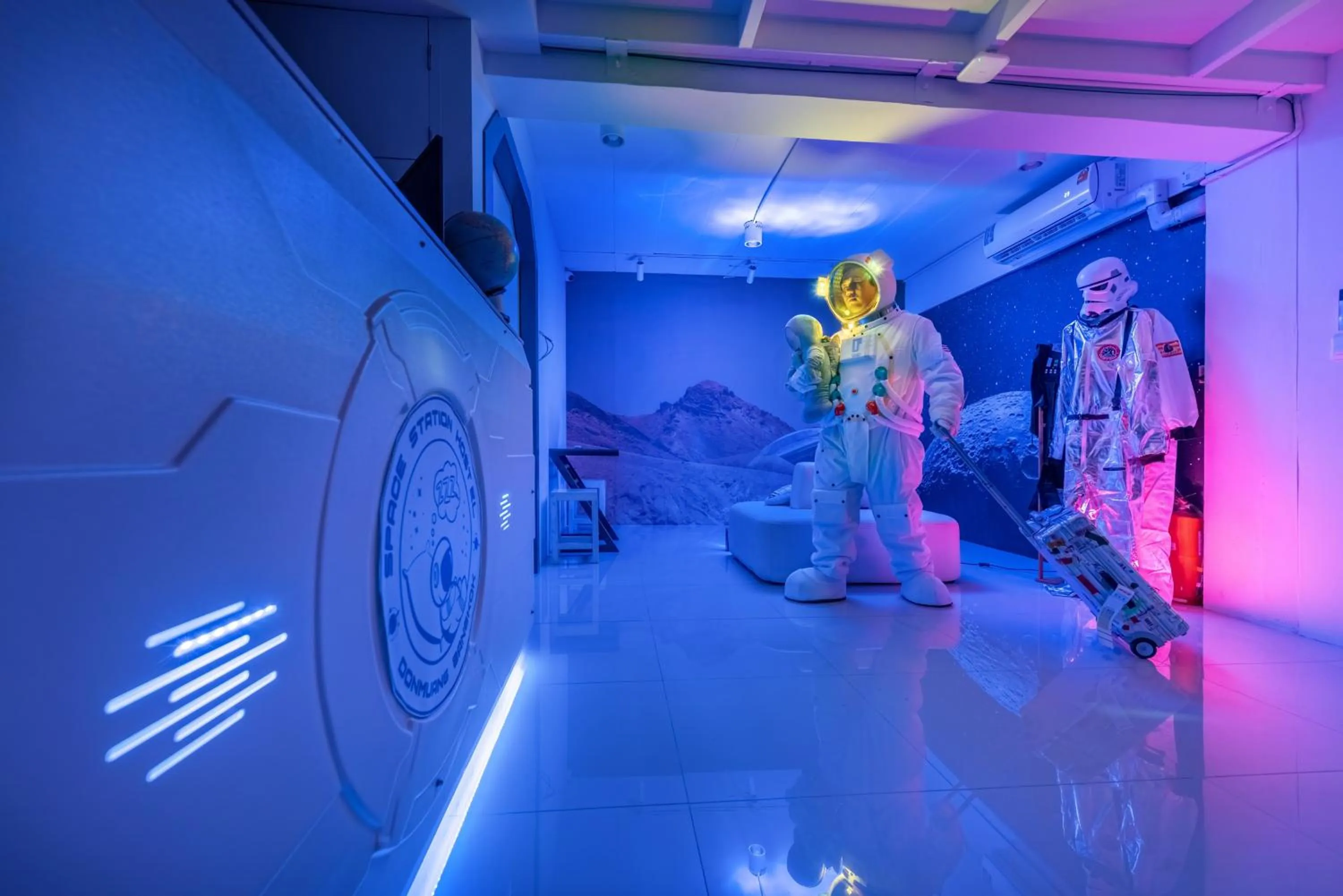 People in Space Station Hostel