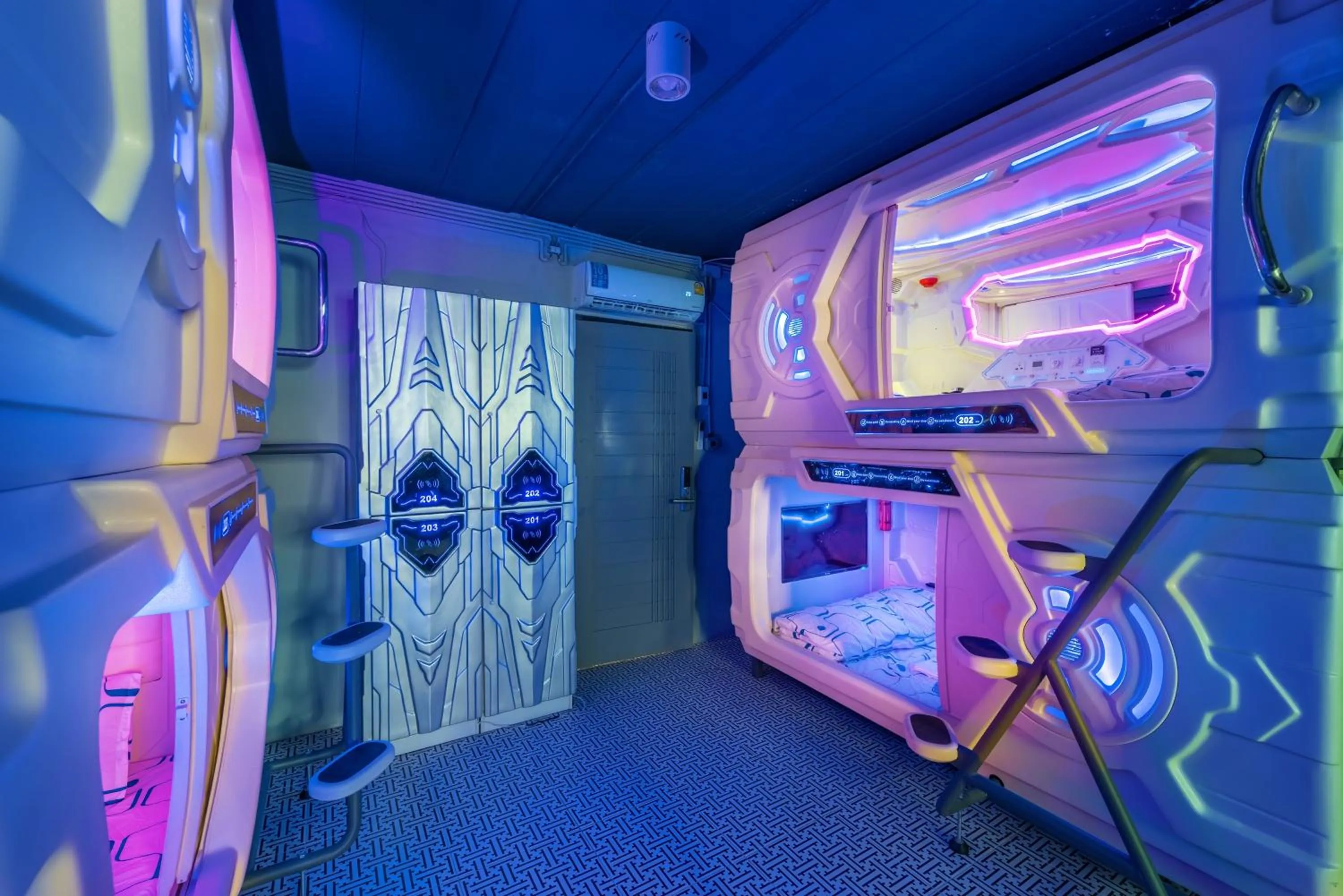 Bed in Space Station Hostel