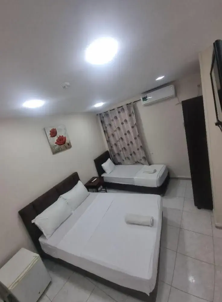 Bed in HOTEL IKRAM Bed in HOTEL IKRAM