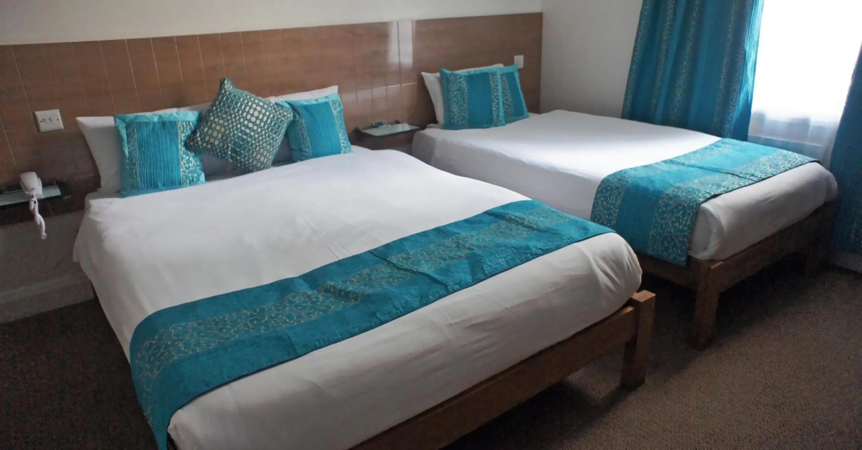 Bed in Westpoint Hotel