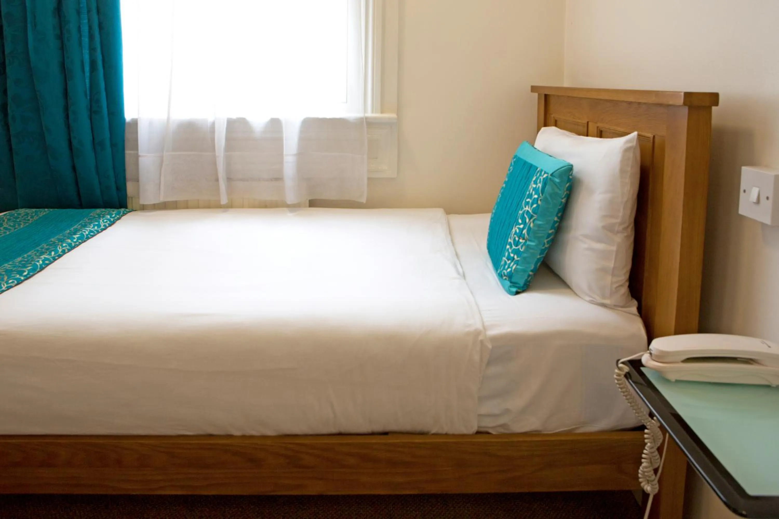 Bed in Westpoint Hotel