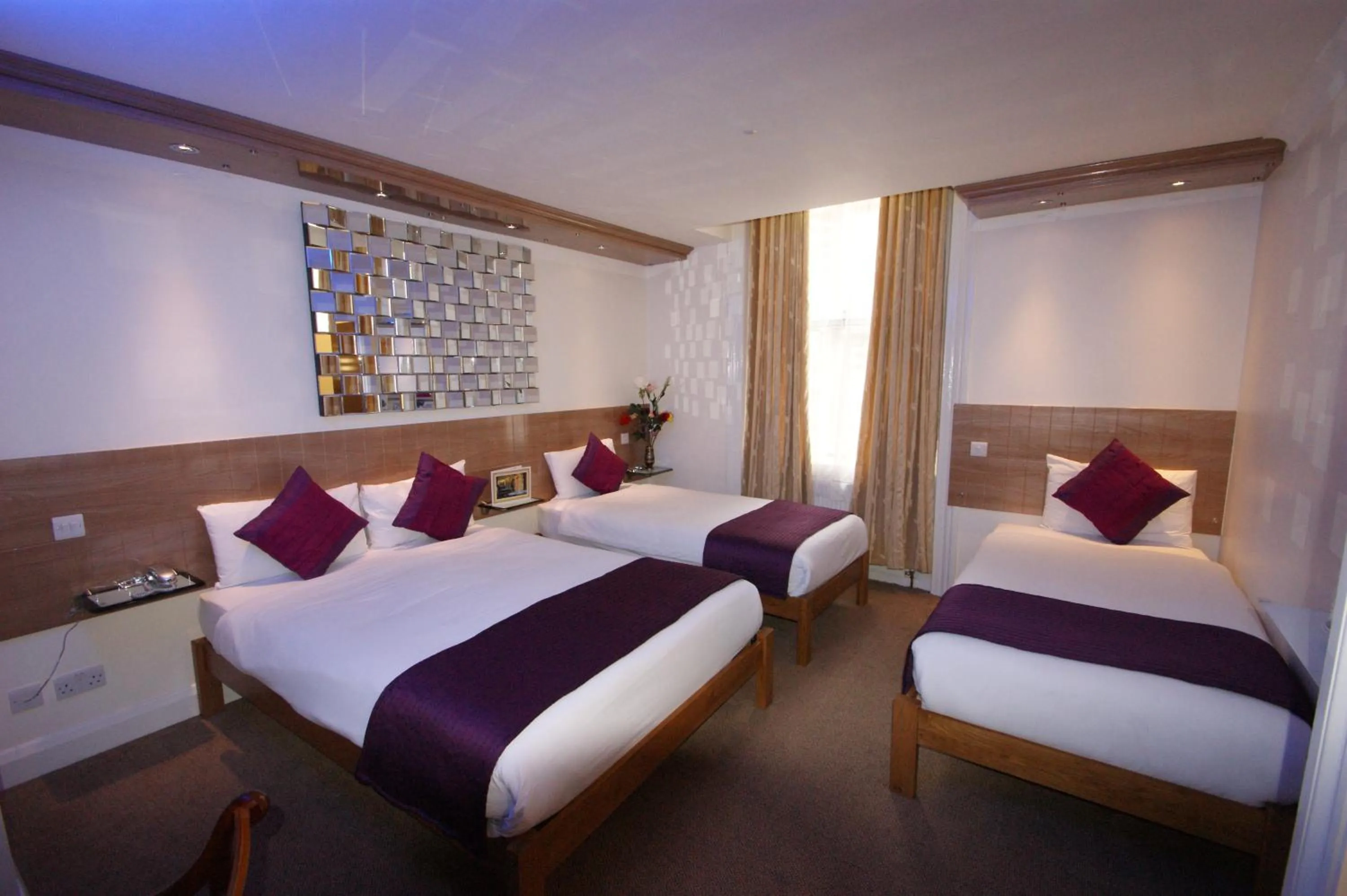 Bed in Westpoint Hotel