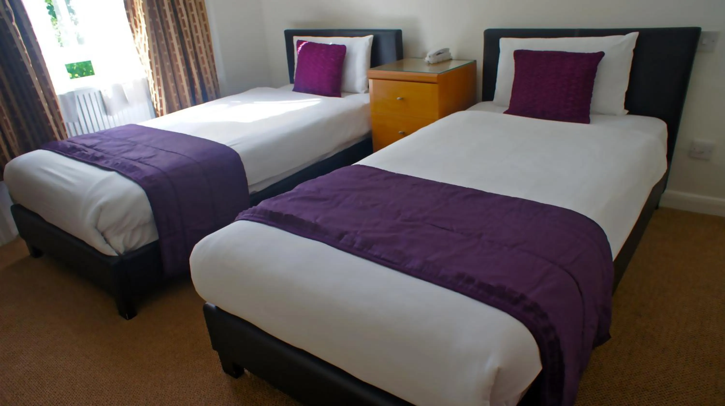 Bed in Westpoint Hotel