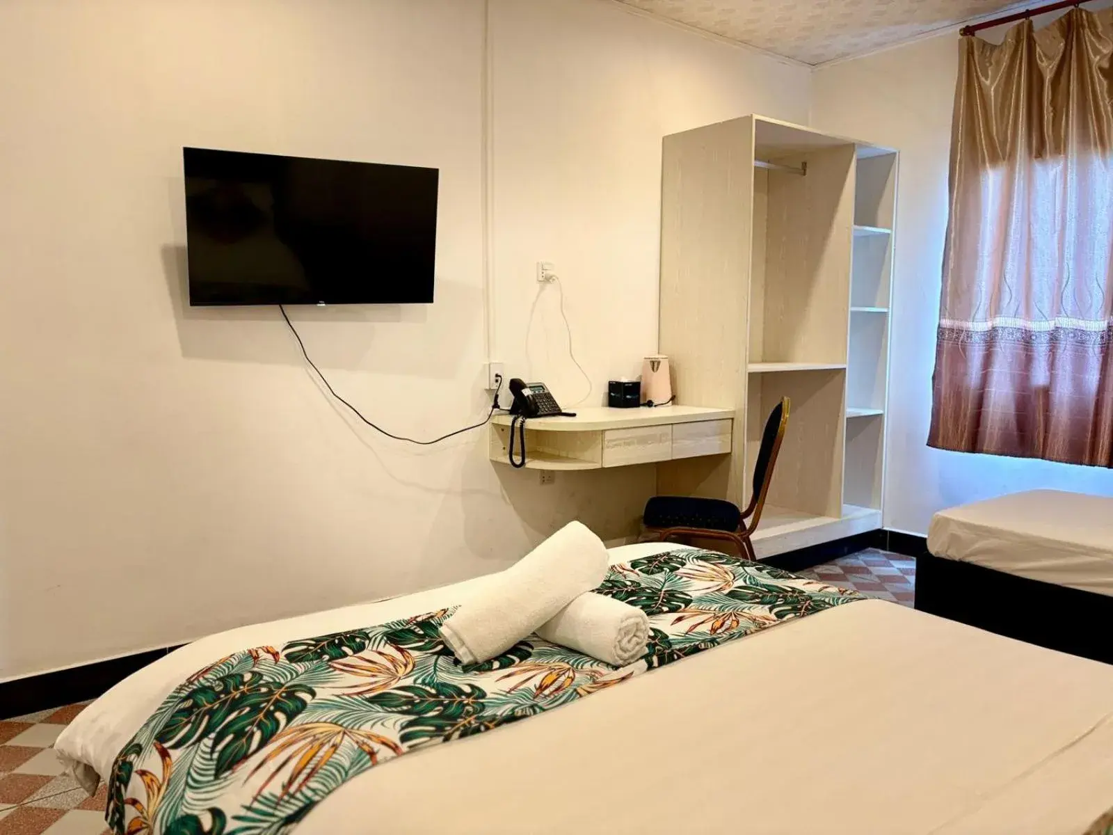 Bed in Crown Royale Hotel & Lounge Bed in Crown Royale Hotel & Lounge