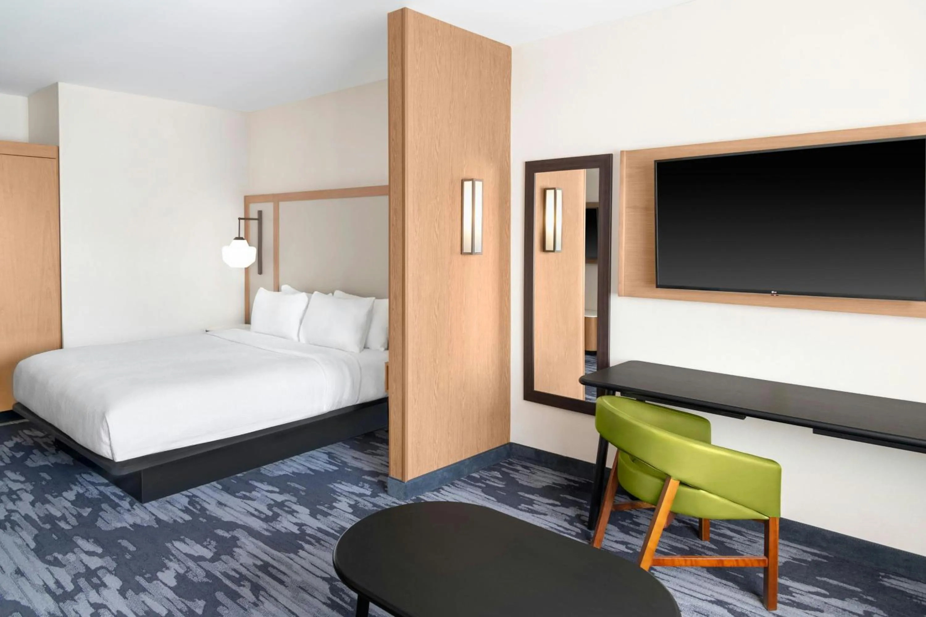 Living room, Bed in Fairfield by Marriott Inn & Suites Detroit Taylor