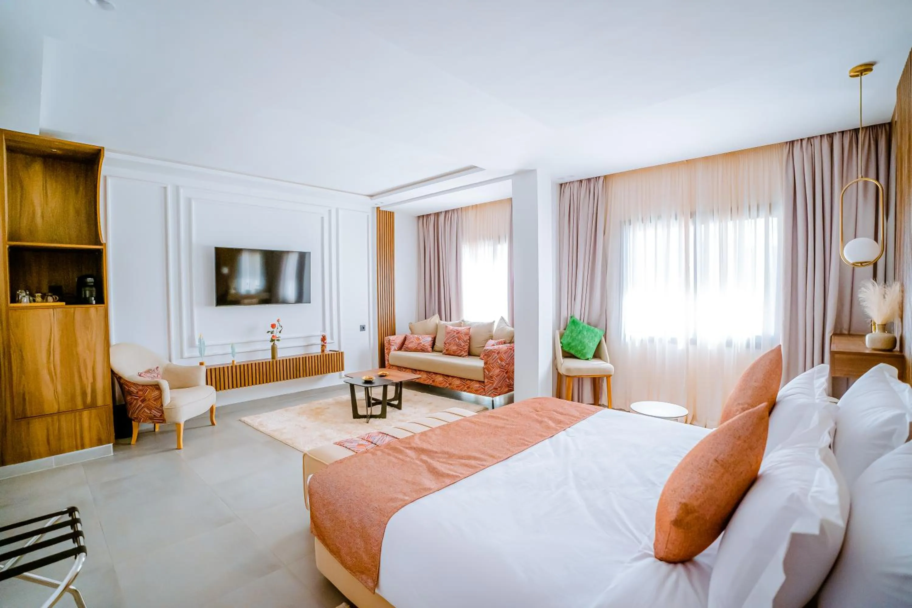 Communal lounge/ TV room, Bed in TIMAZIN HOTEL DAKHLA