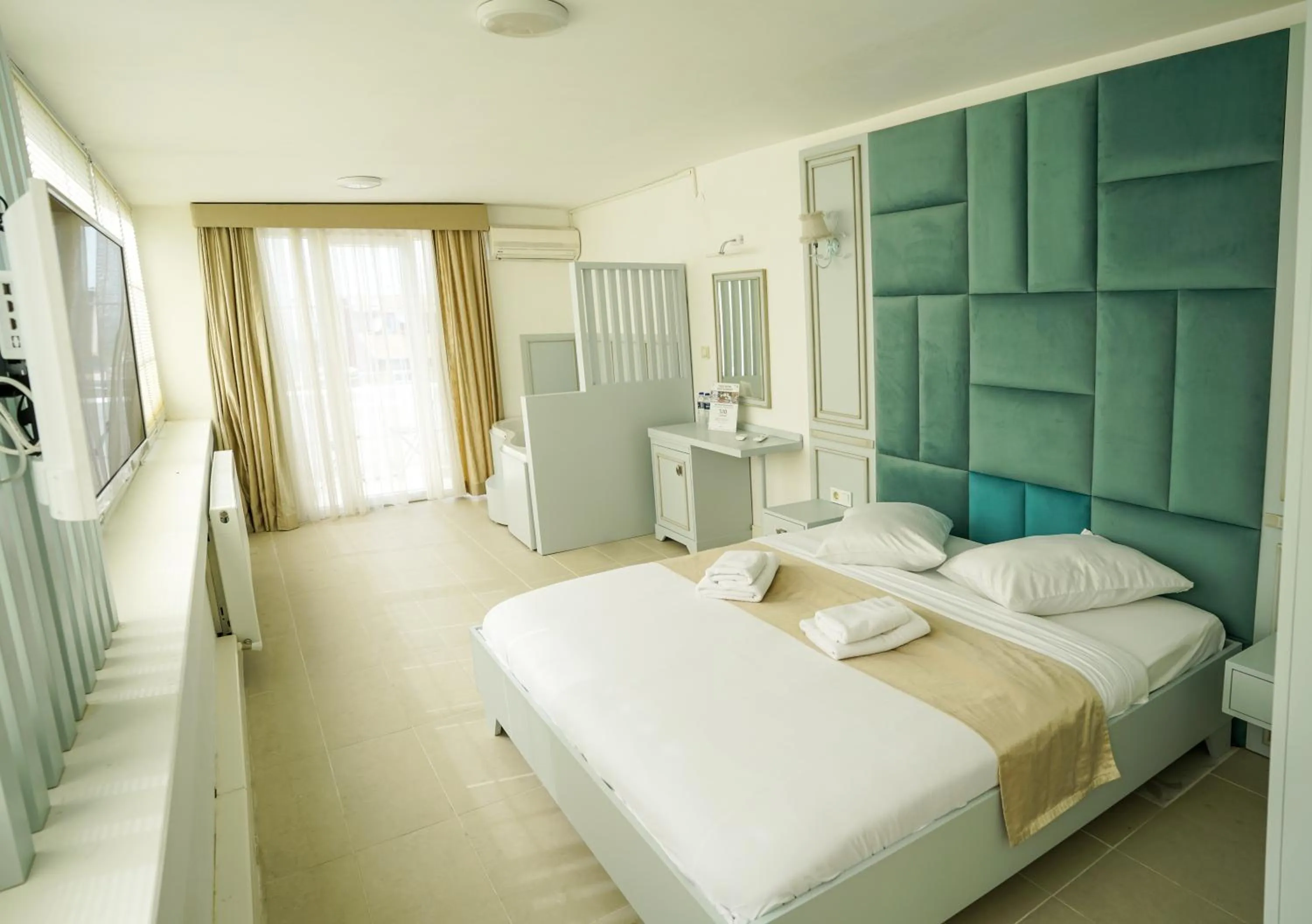 Bed in Buyukada Cankaya Hotel