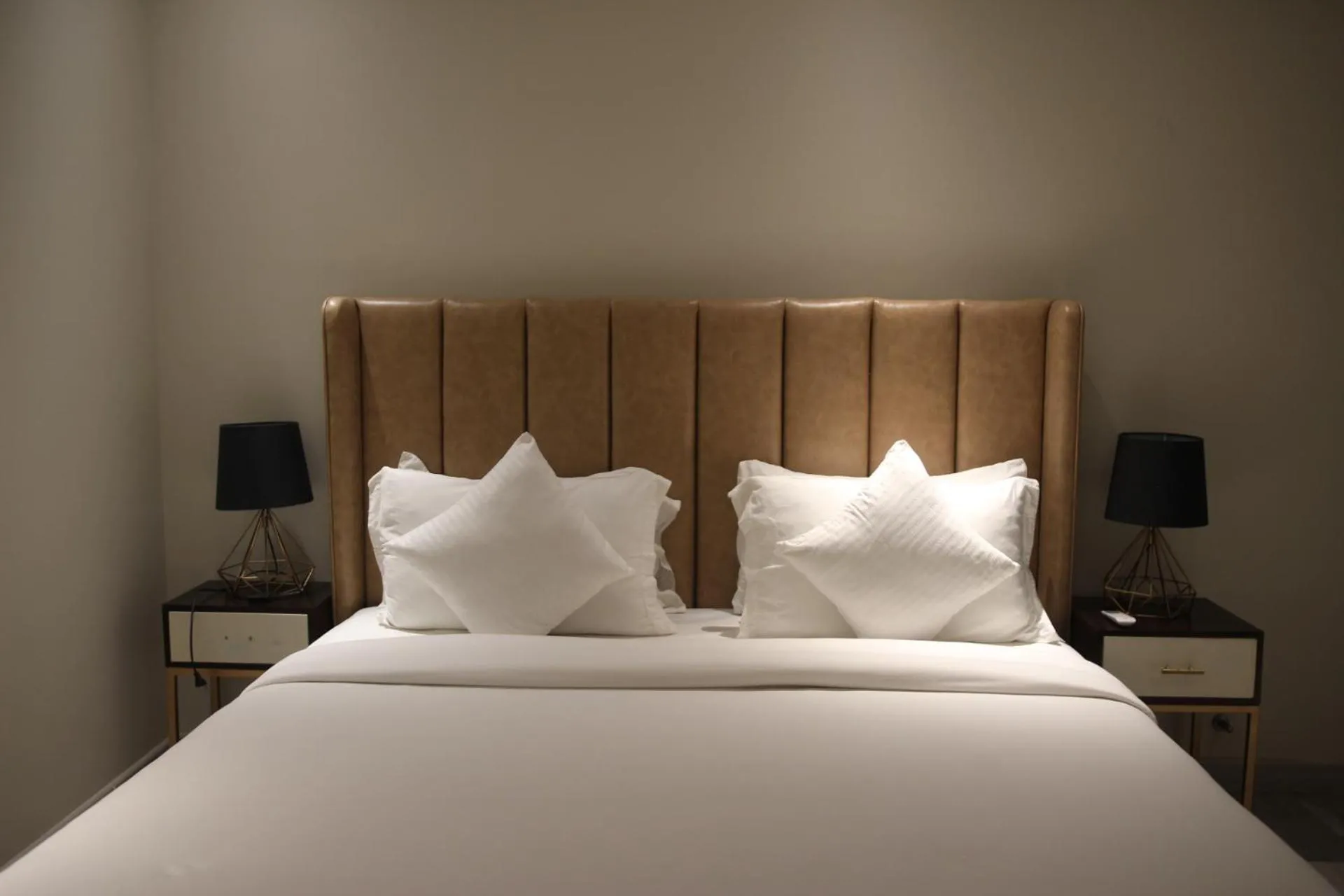 Bed in The Opus Luxury Residences