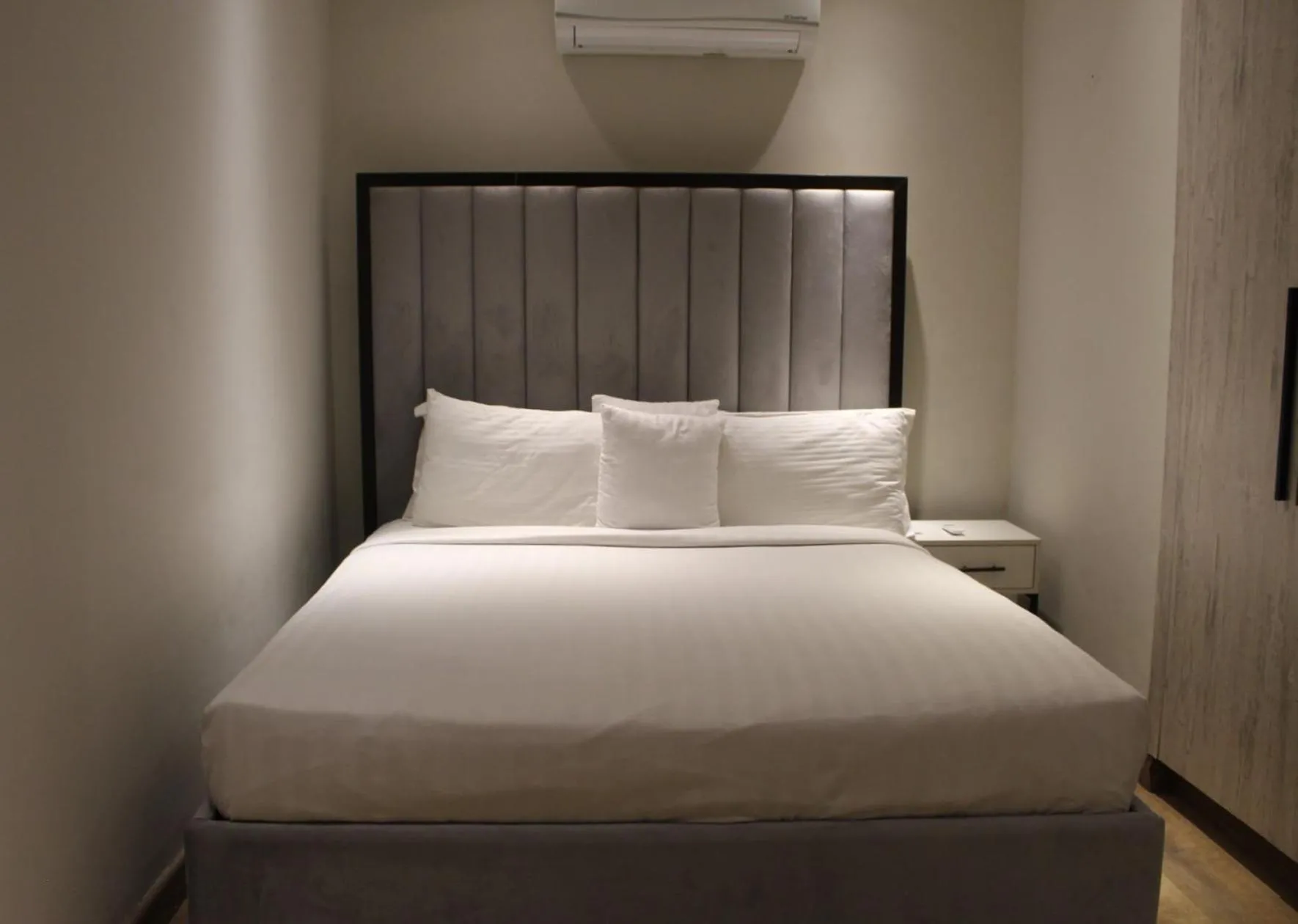 Bed in The Opus Luxury Residences