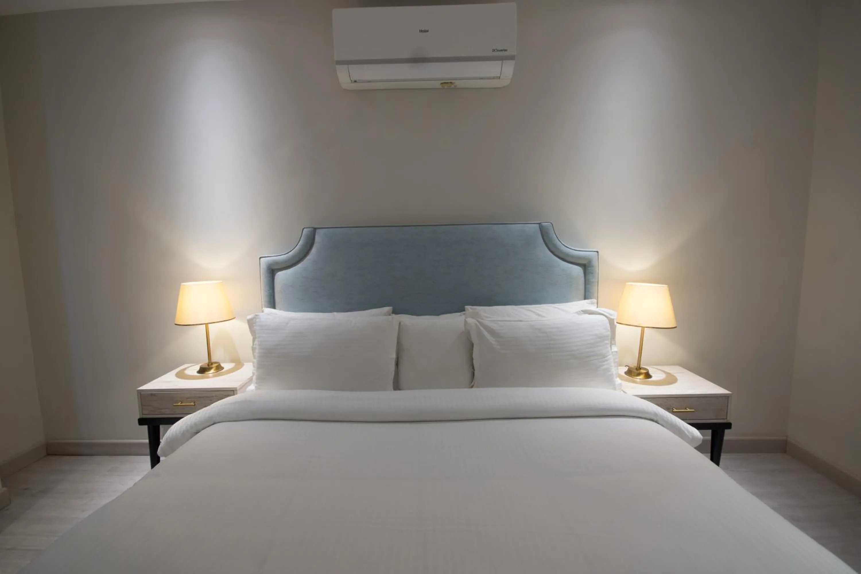 Bed in The Opus Luxury Residences