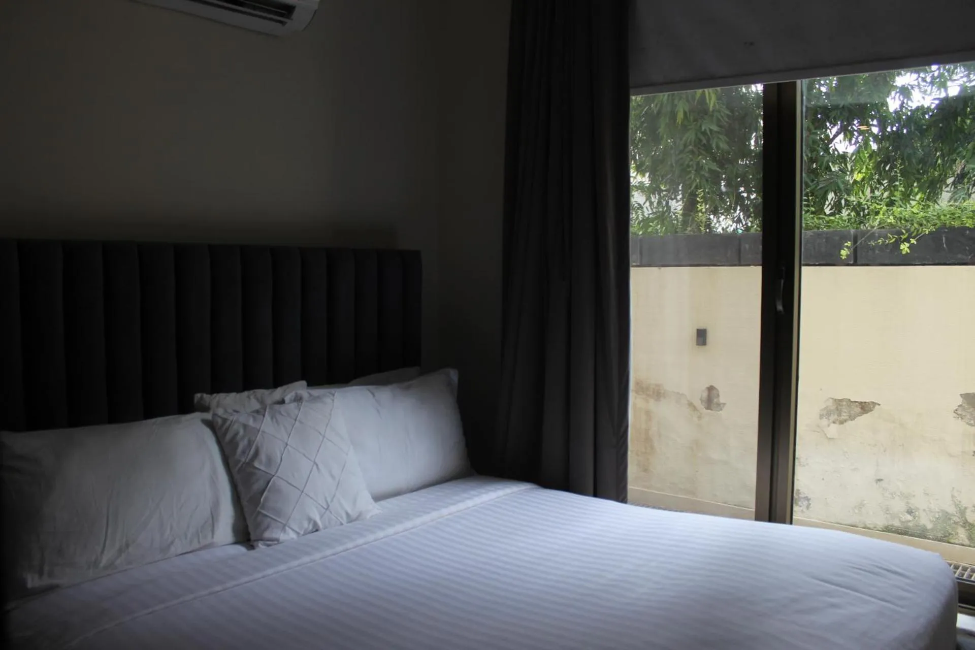 Bed in The Opus Luxury Residences