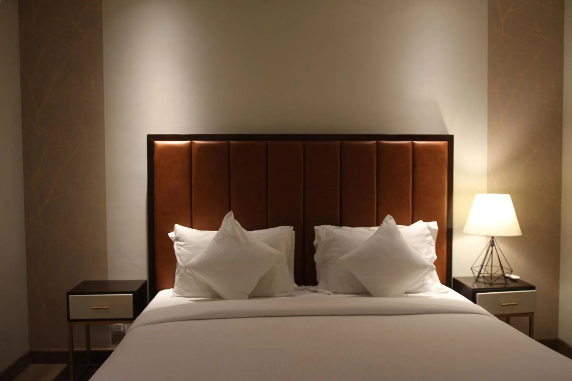 Bed in The Opus Luxury Residences