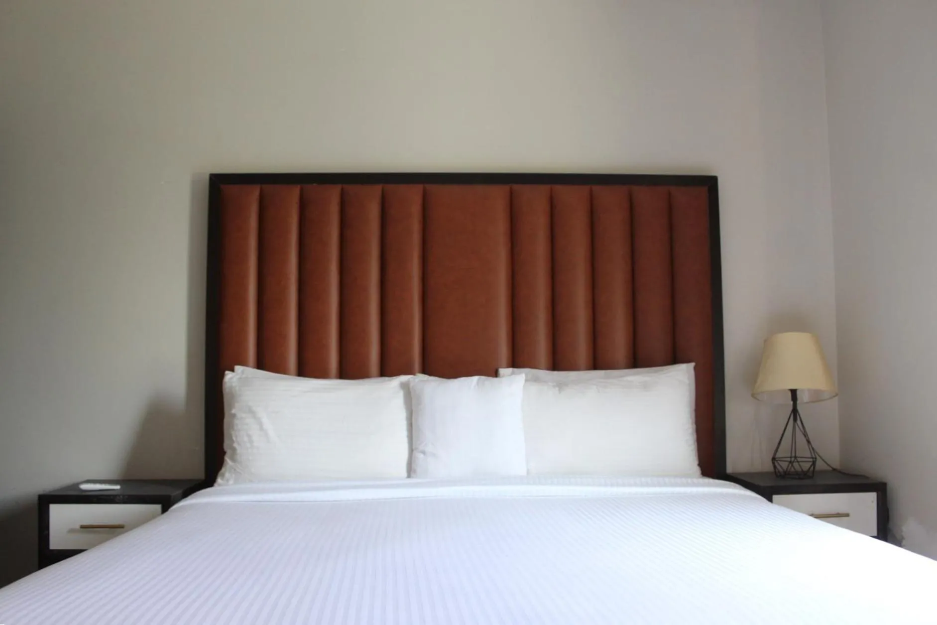 Bed in The Opus Luxury Residences