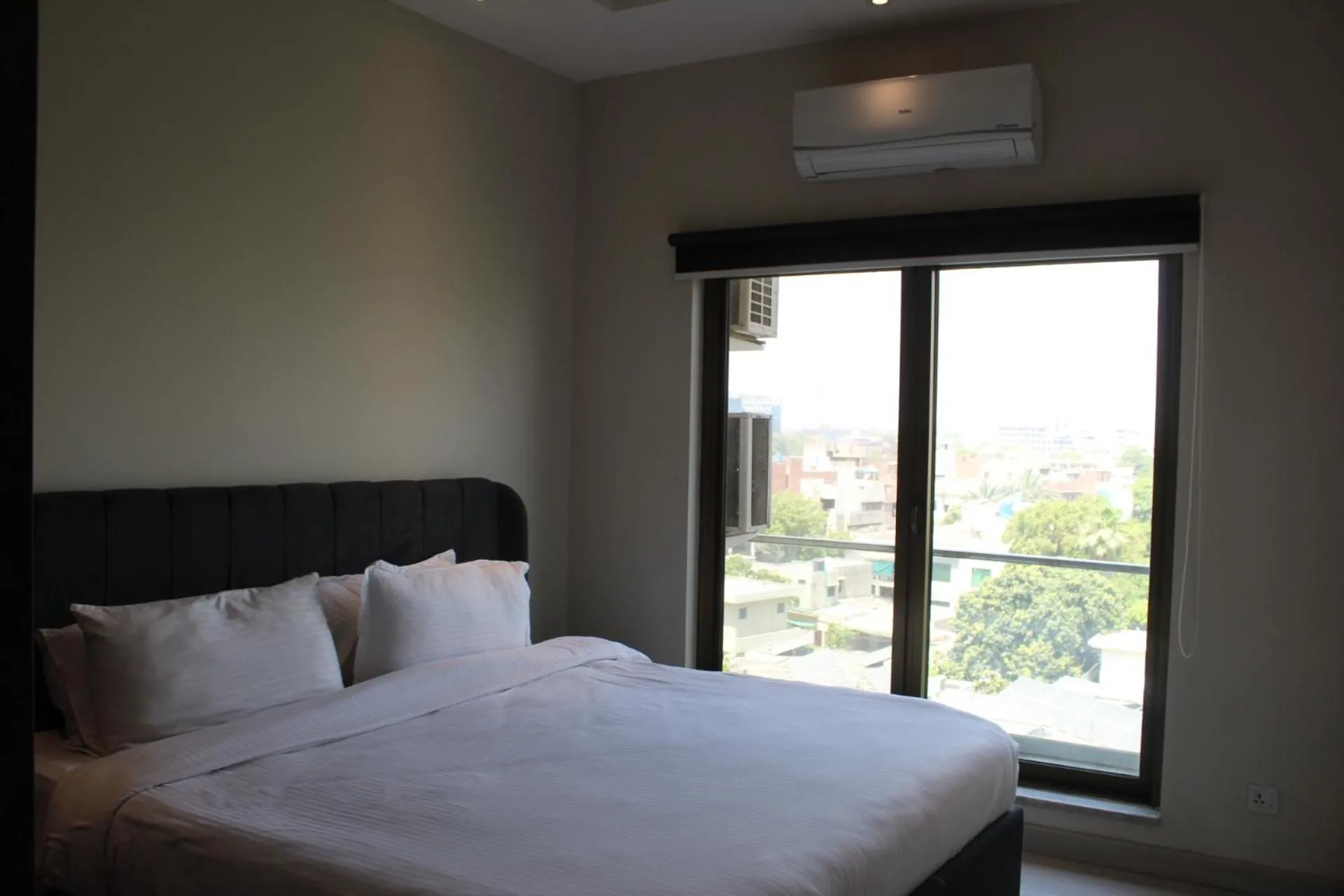 Bed in The Opus Luxury Residences