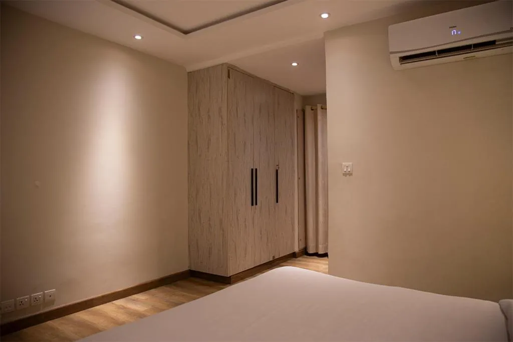 Bed in The Opus Luxury Residences