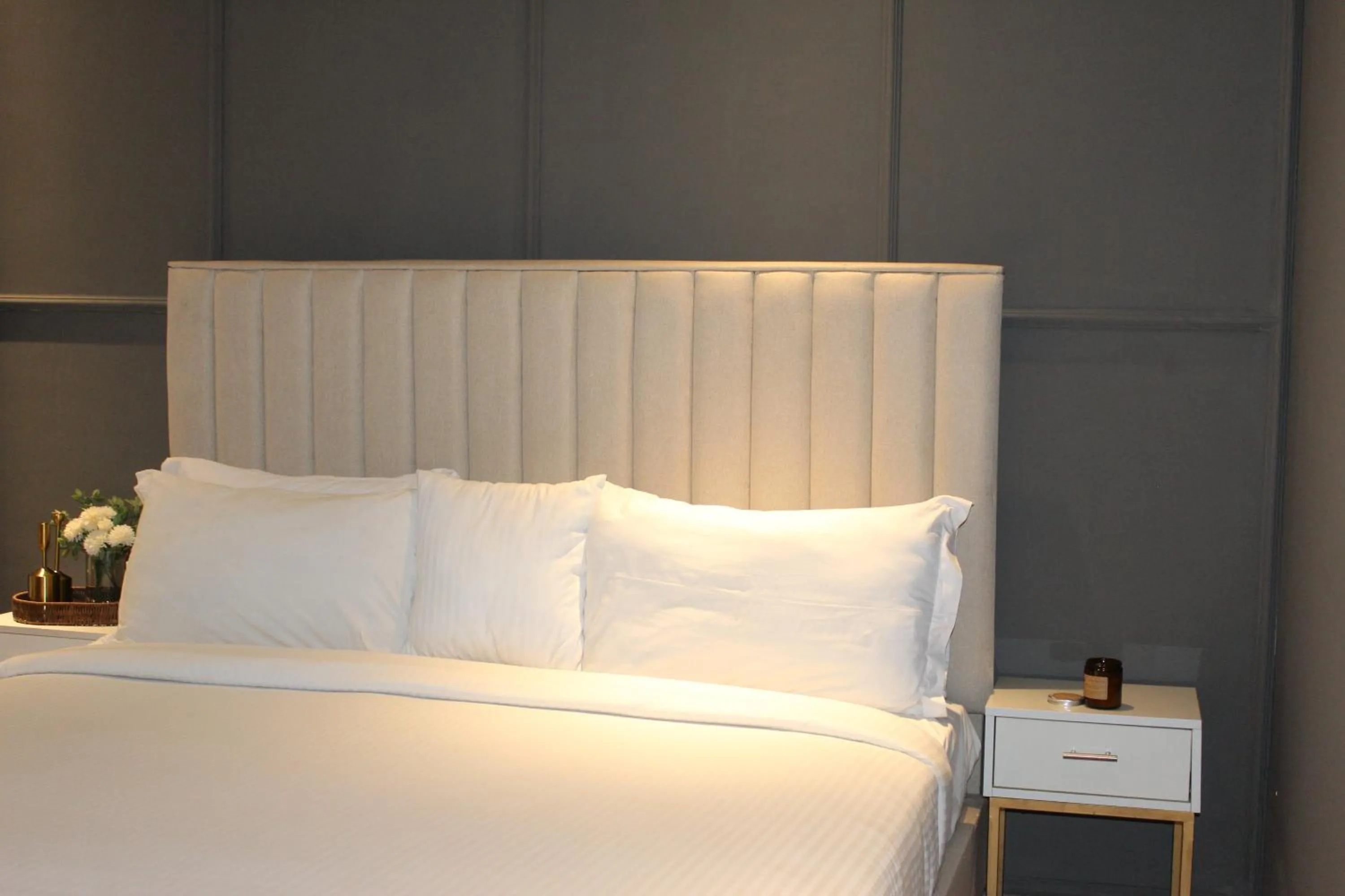 Bed in The Opus Luxury Residences