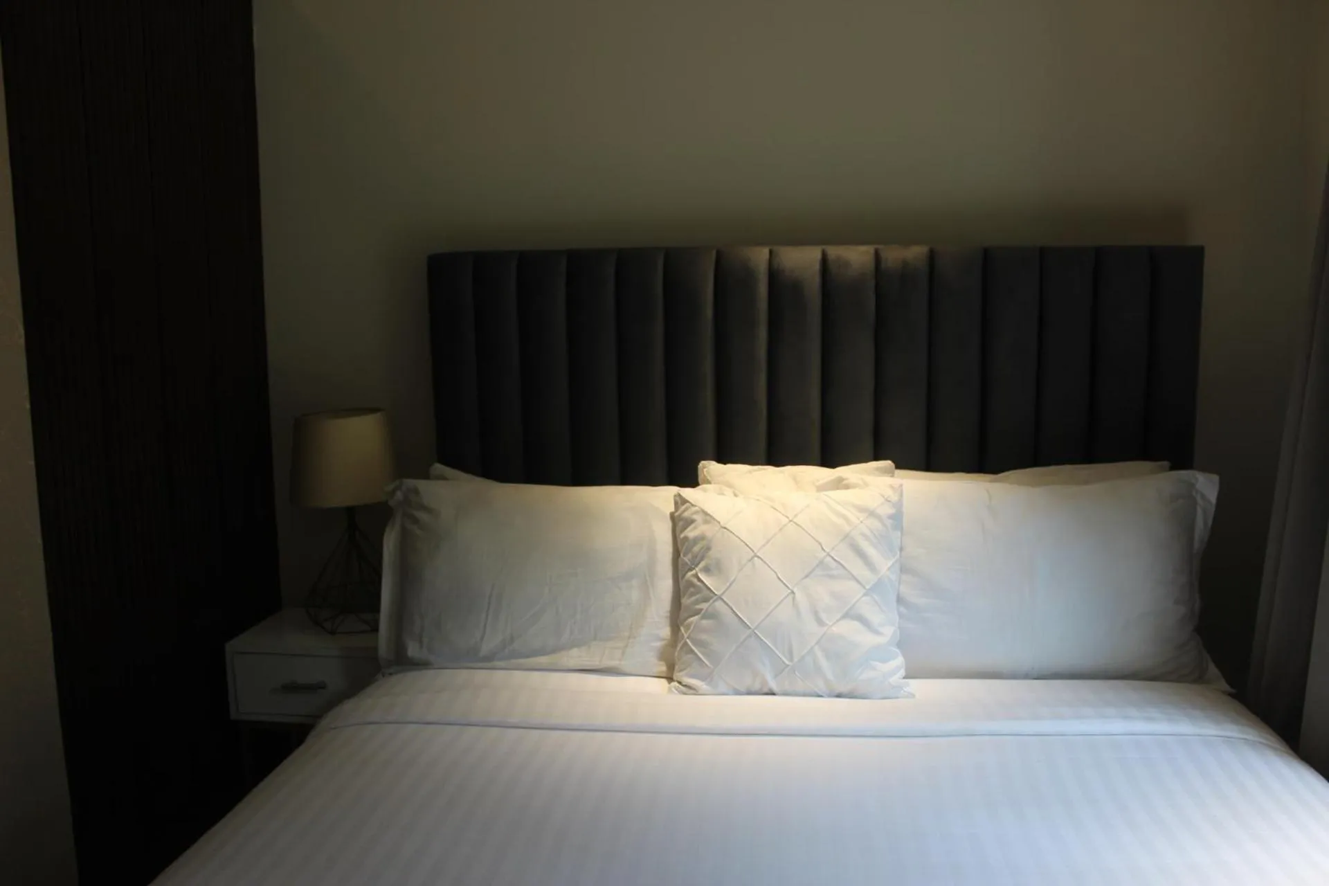 Bed in The Opus Luxury Residences