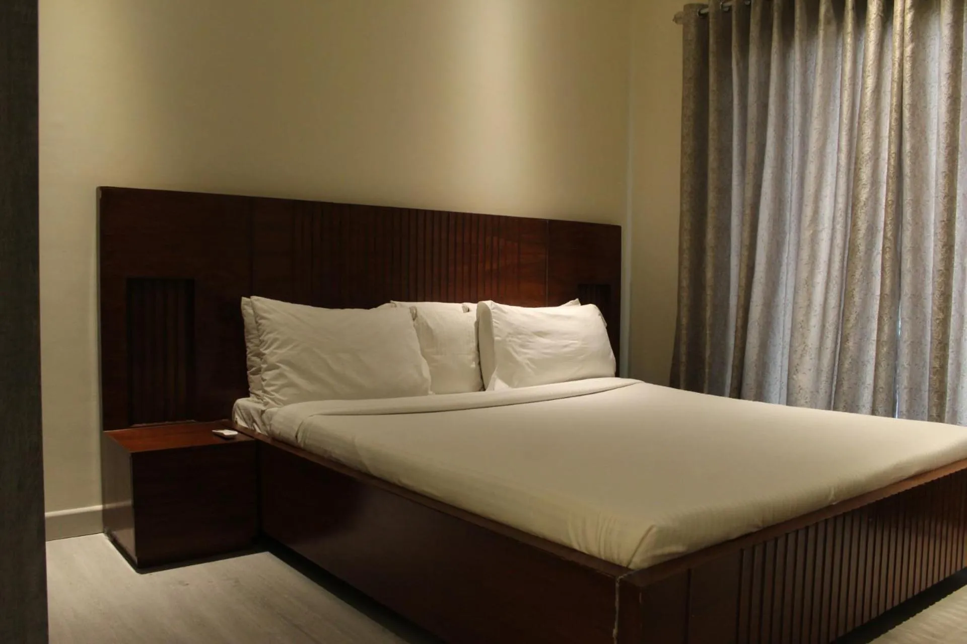 Bed in The Opus Luxury Residences