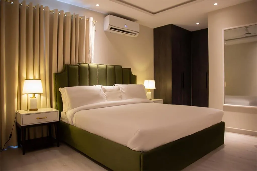 Bed in The Opus Luxury Residences