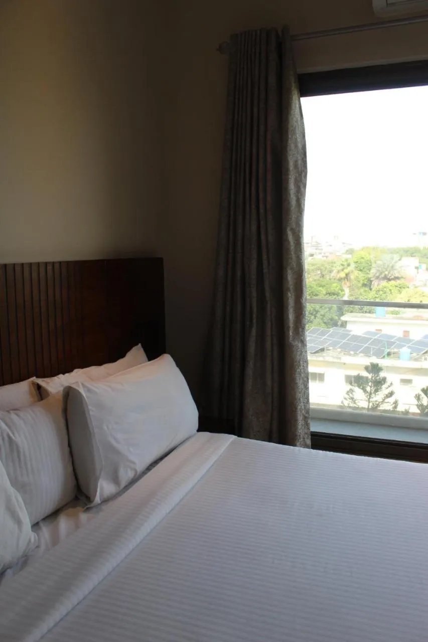 Bed in The Opus Luxury Residences