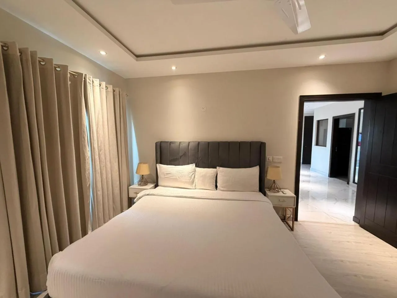 Bed in The Opus Luxury Residences