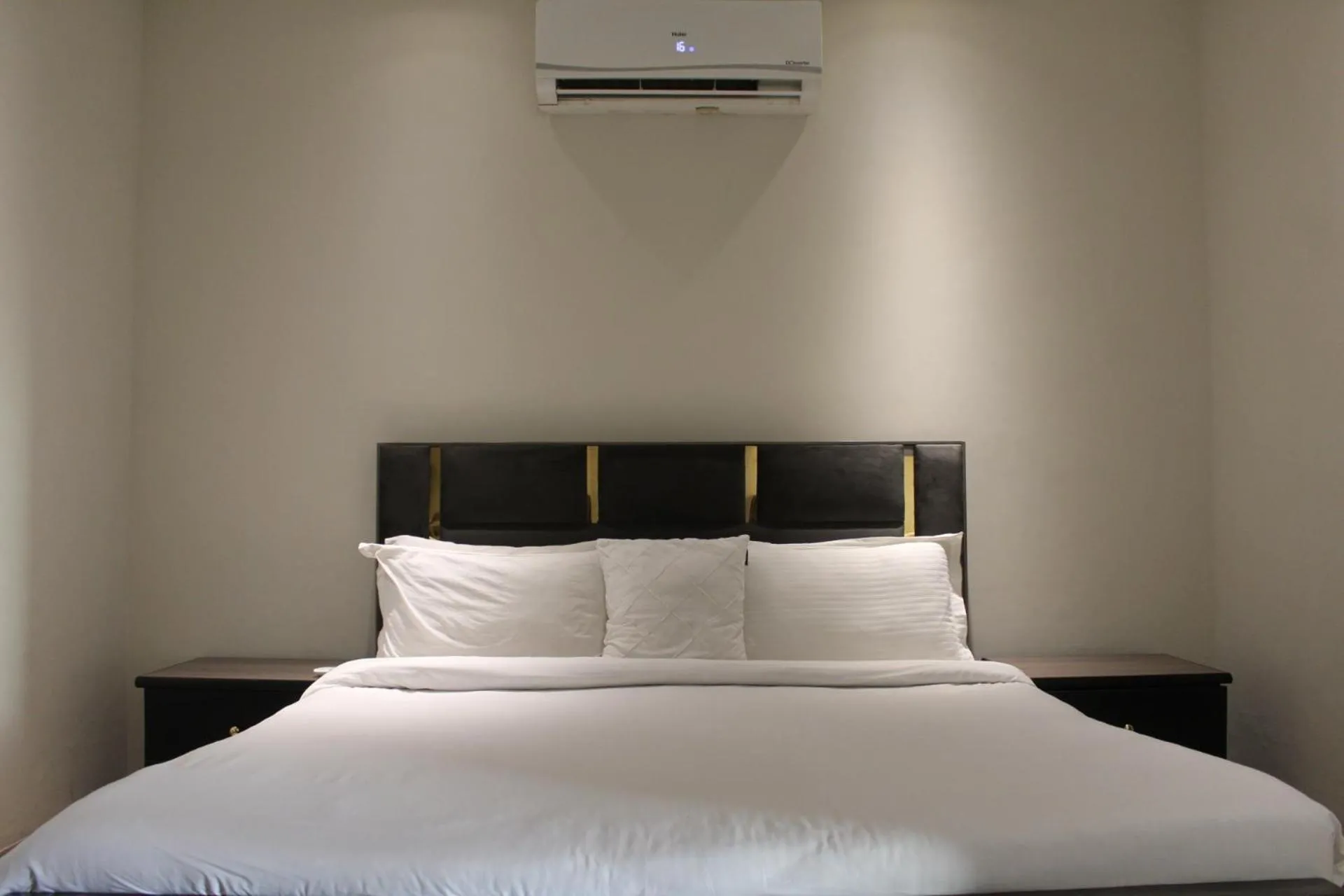 Bed in The Opus Luxury Residences