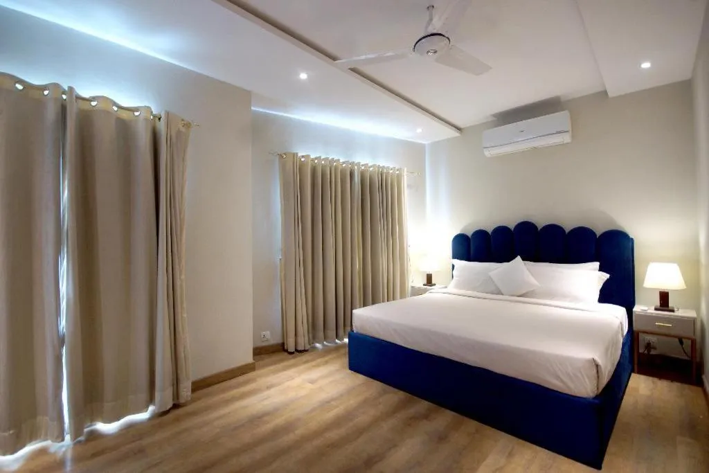 Bed in The Opus Luxury Residences