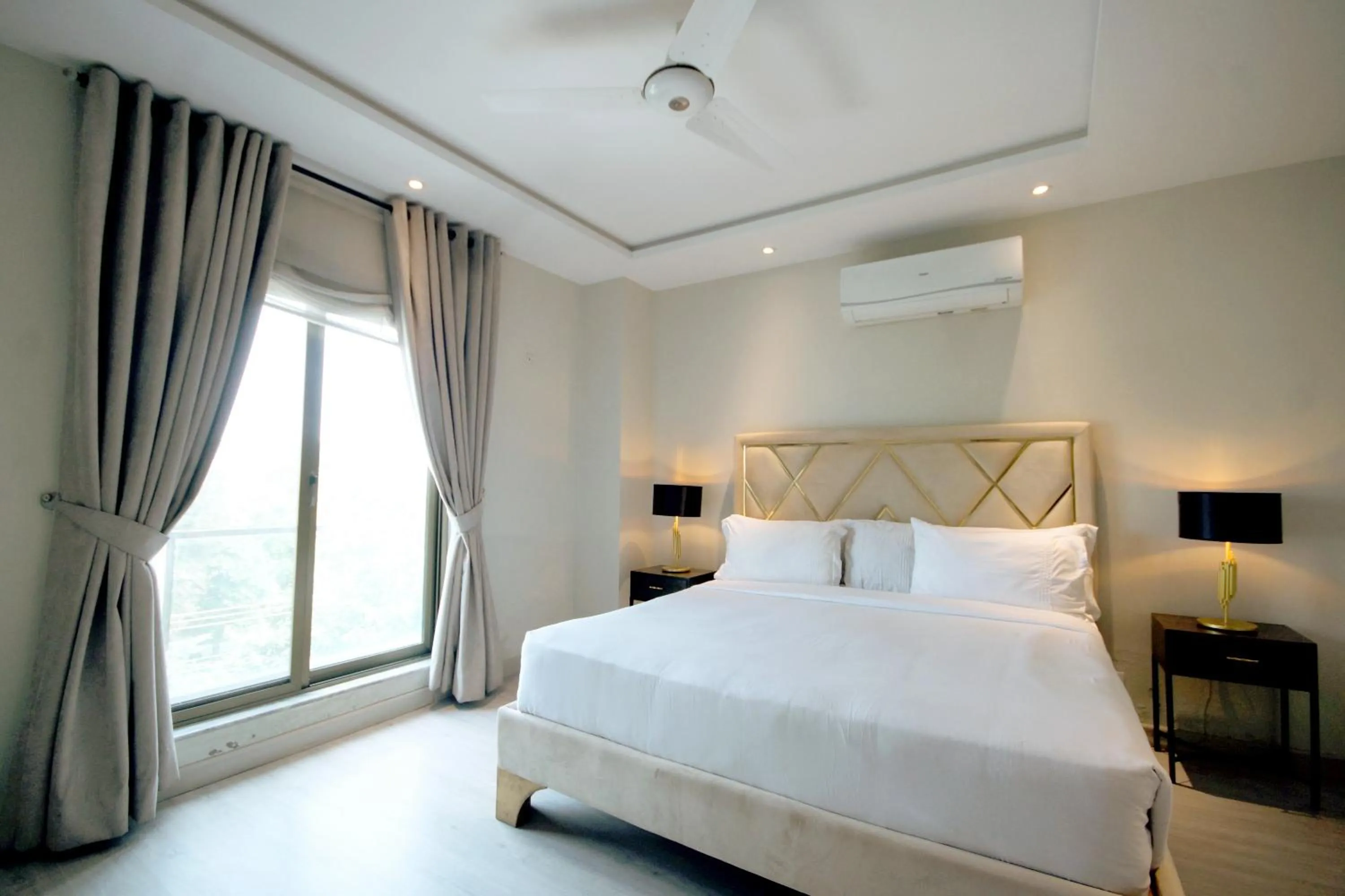 Bed in The Opus Luxury Residences