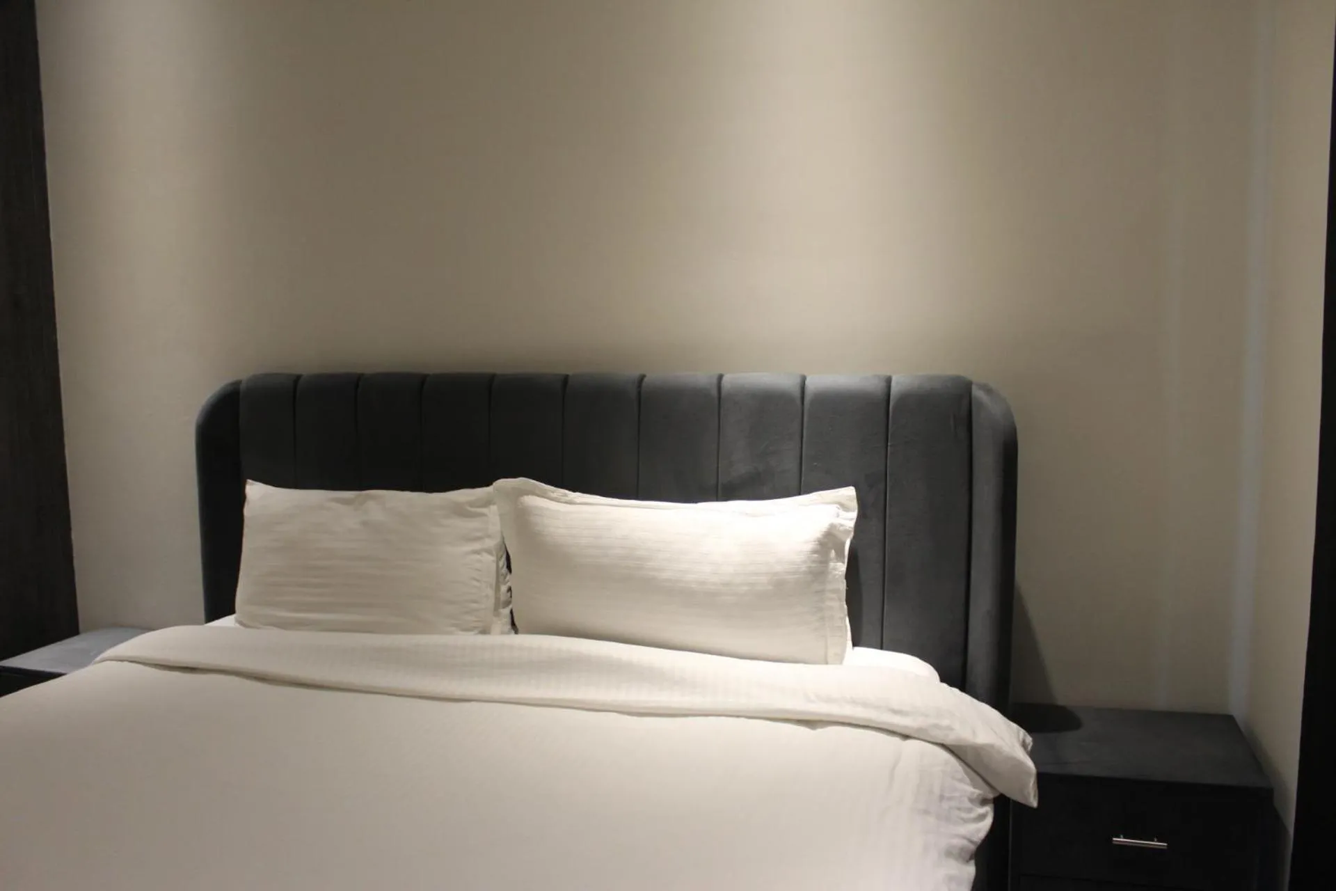 Bed in The Opus Luxury Residences