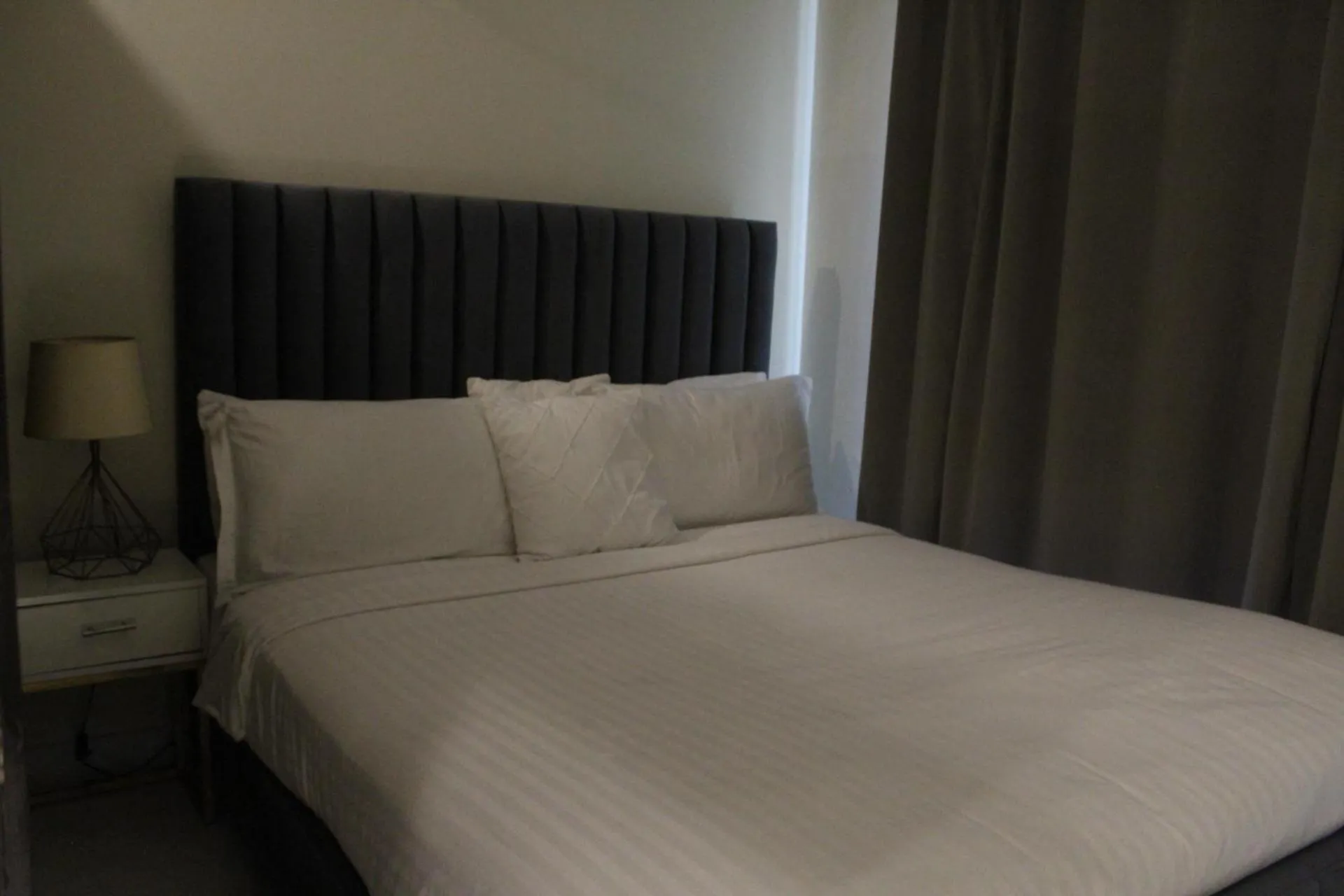 Bed in The Opus Luxury Residences