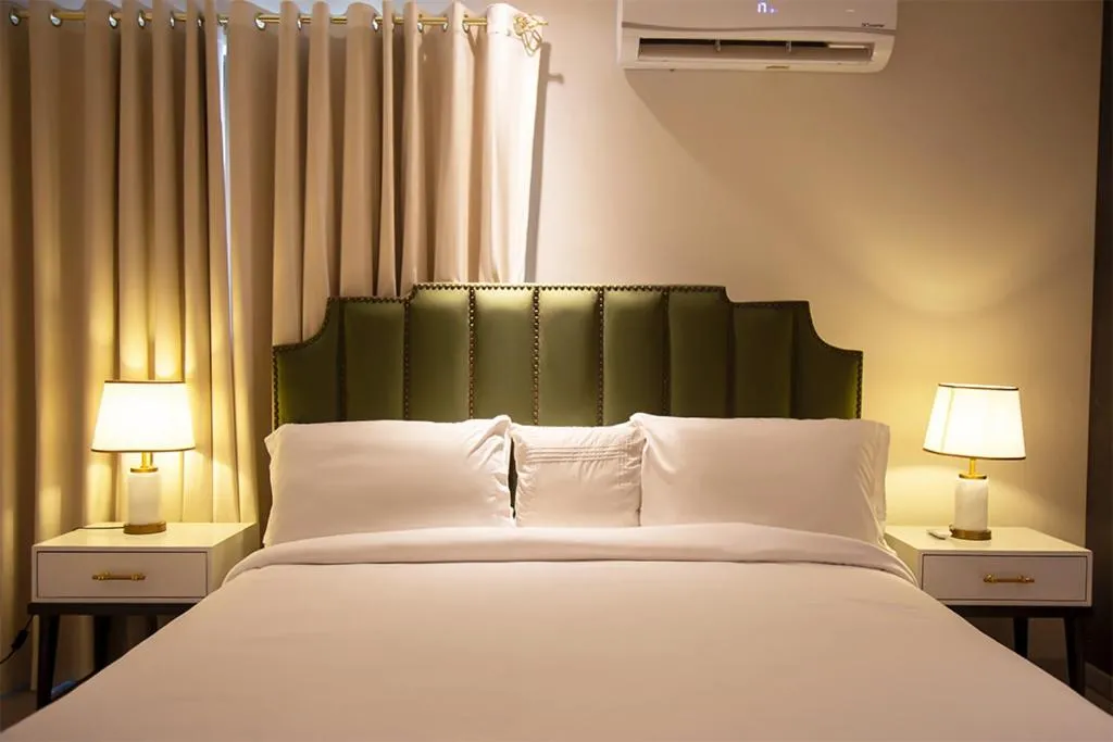 Bed in The Opus Luxury Residences