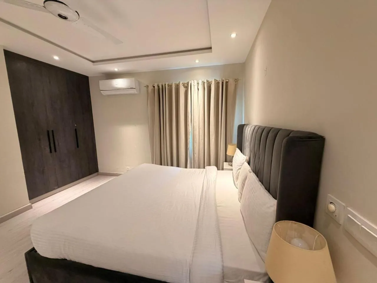 Bed in The Opus Luxury Residences