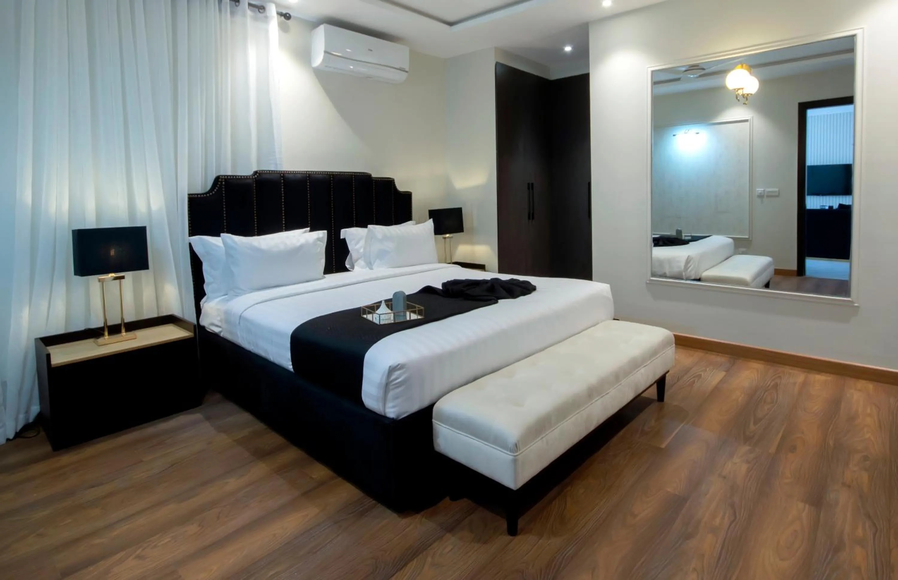 Bed in The Opus Luxury Residences